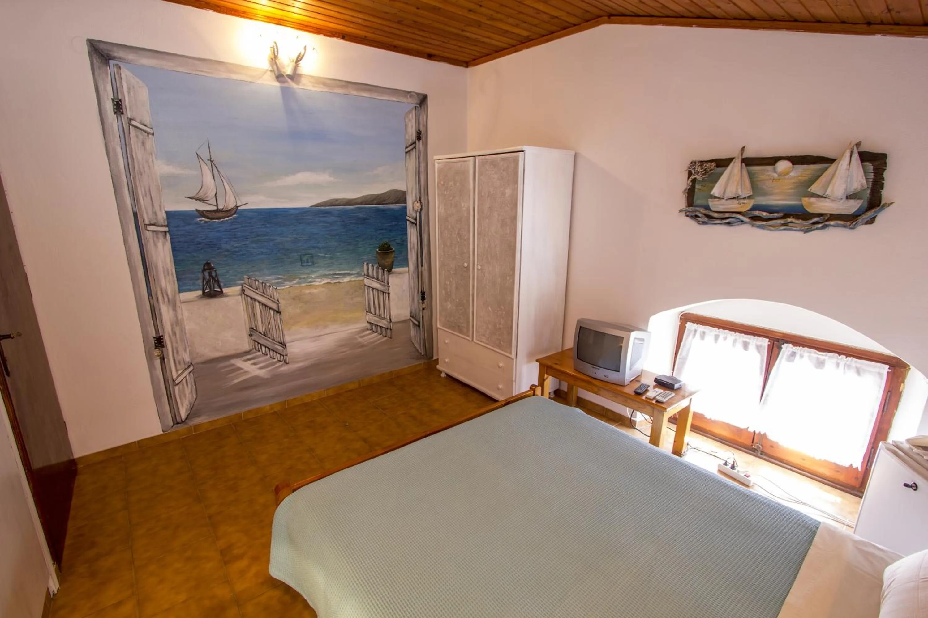 Bed in Symi Center Hotel