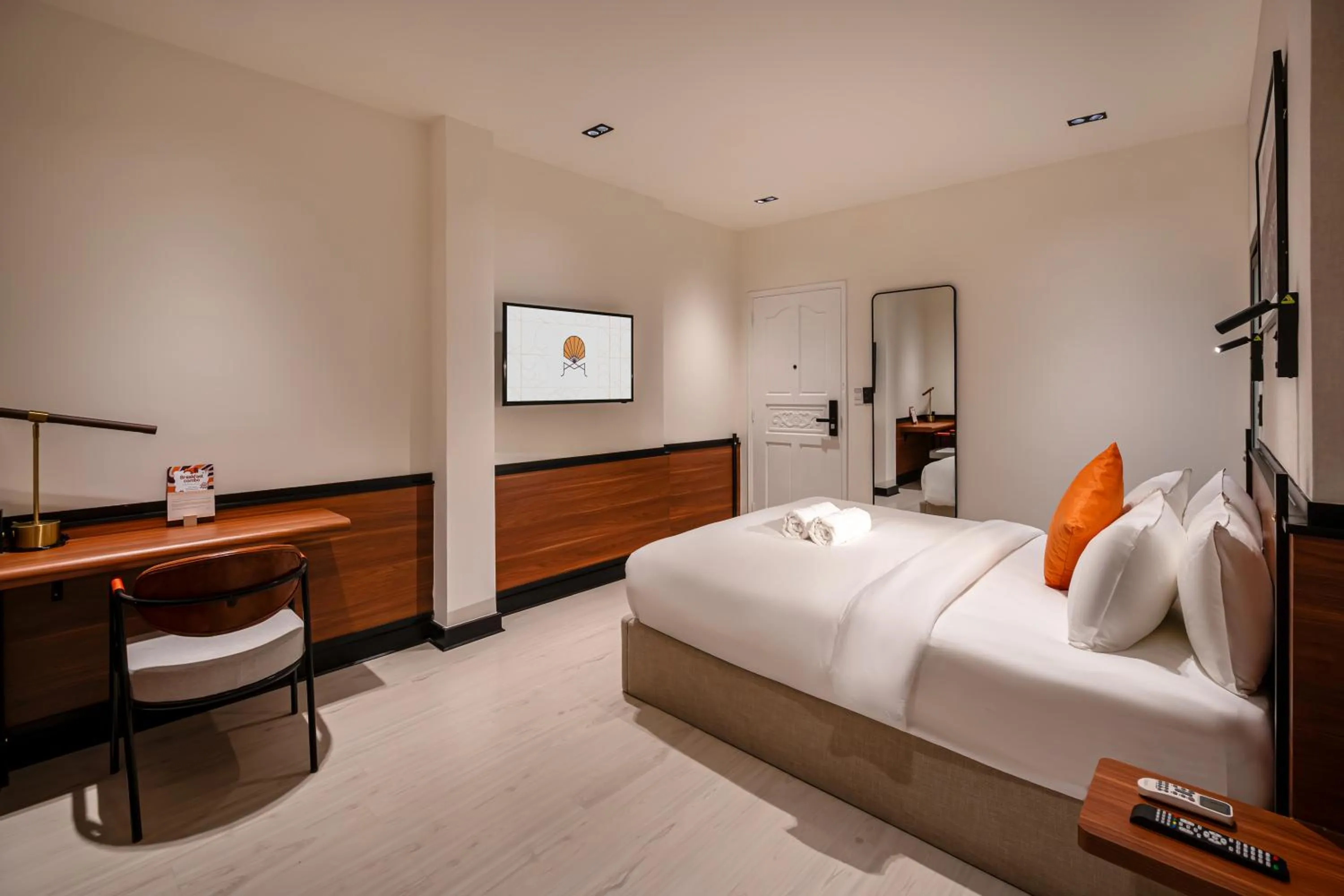 Bed in Metrolux City Contemporary Hotel