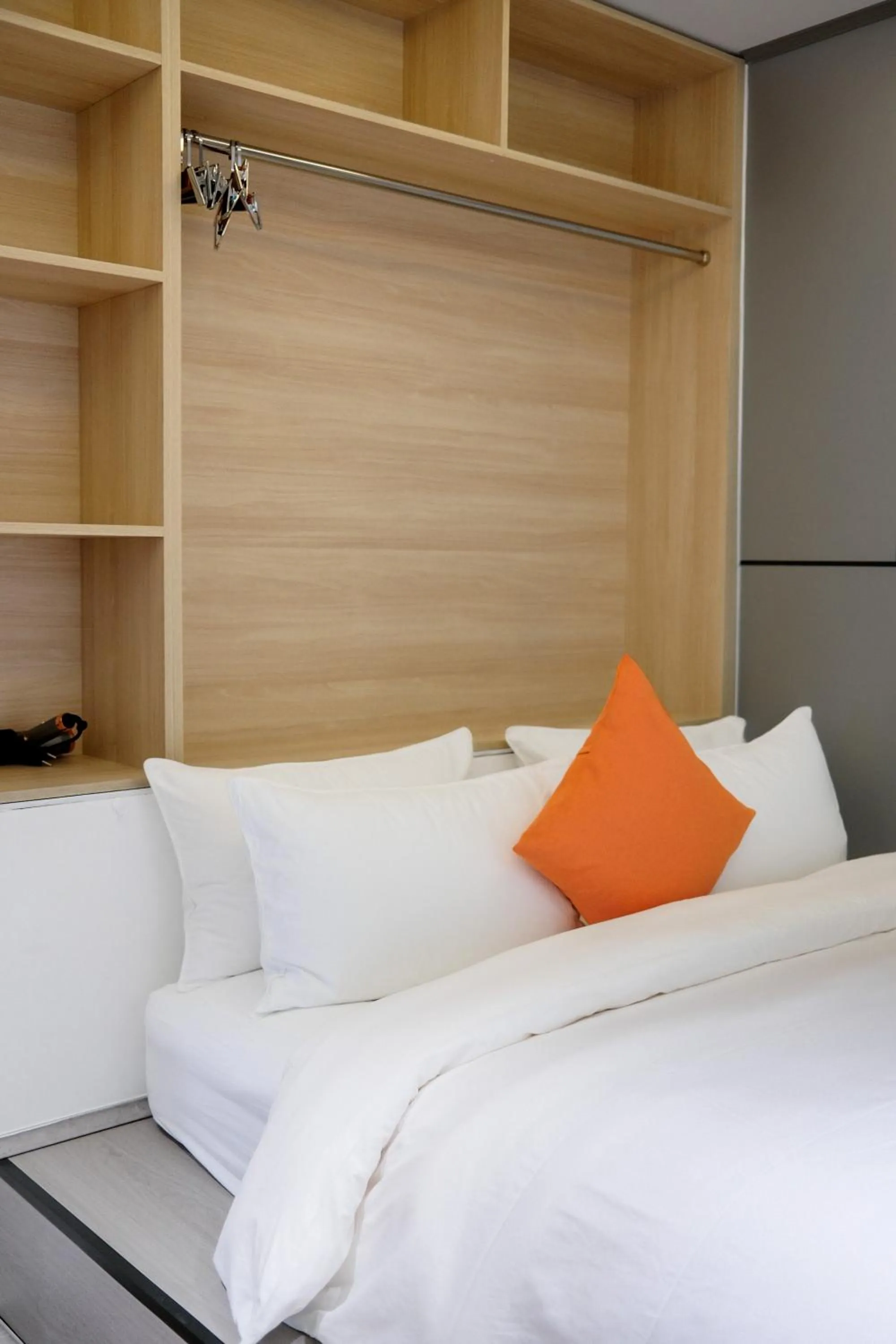 Bed in Metrolux City Contemporary Hotel