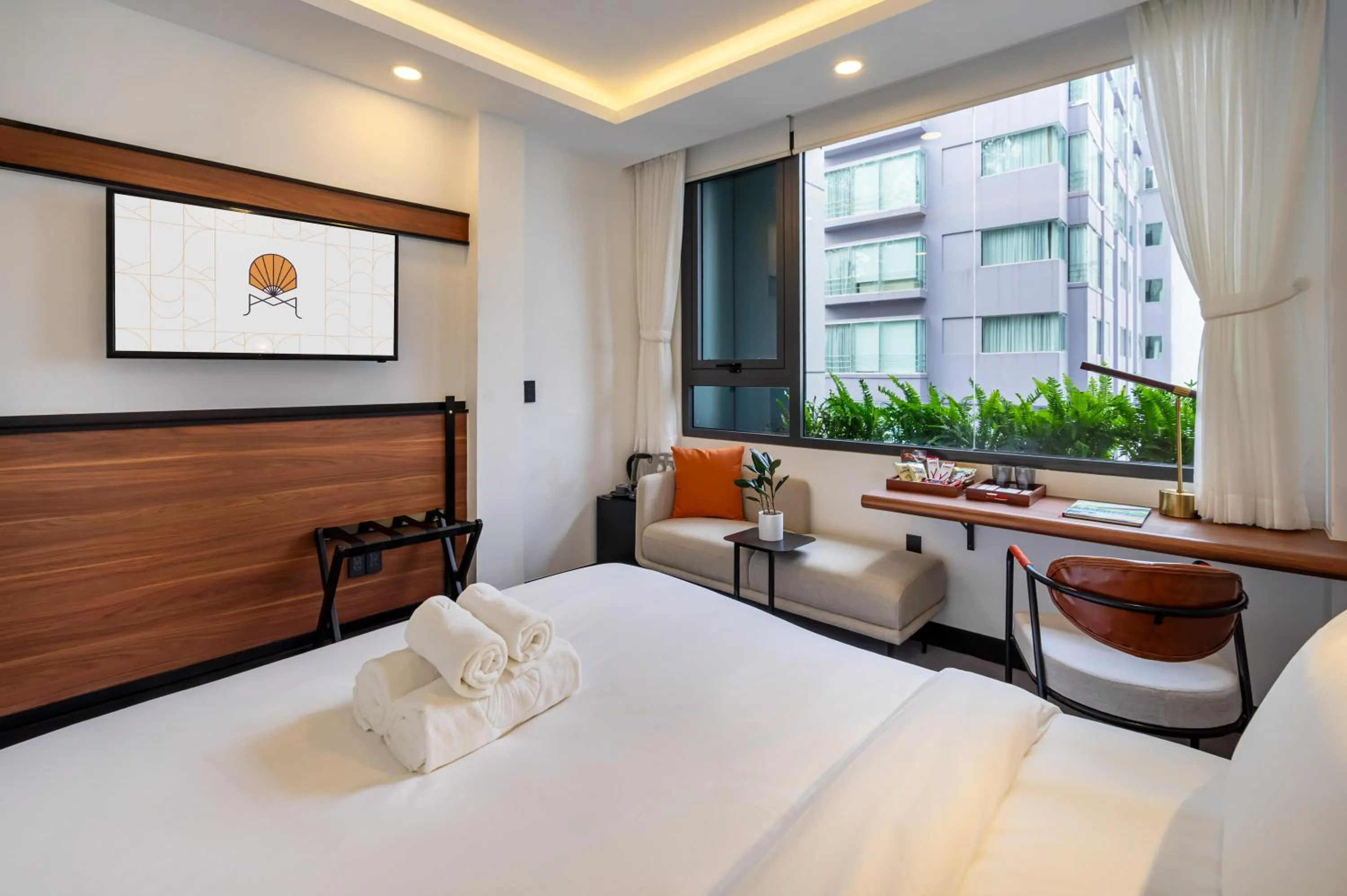 Bed in Metrolux City Contemporary Hotel