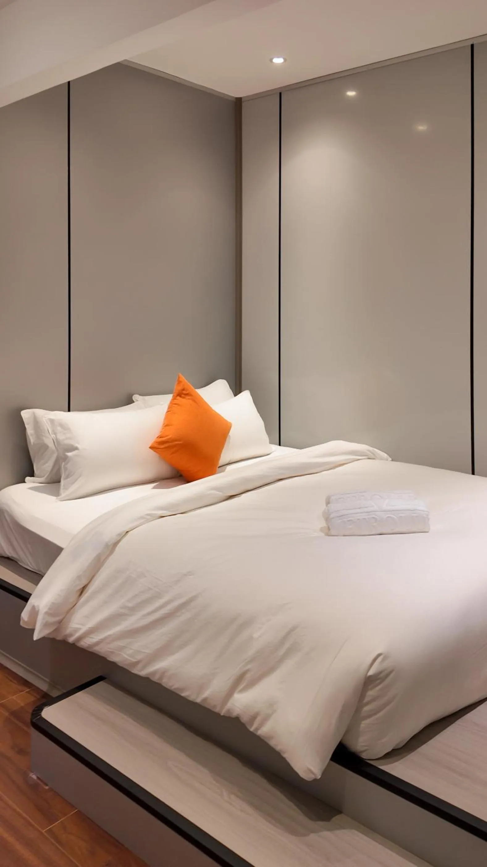 Bed in Metrolux City Contemporary Hotel