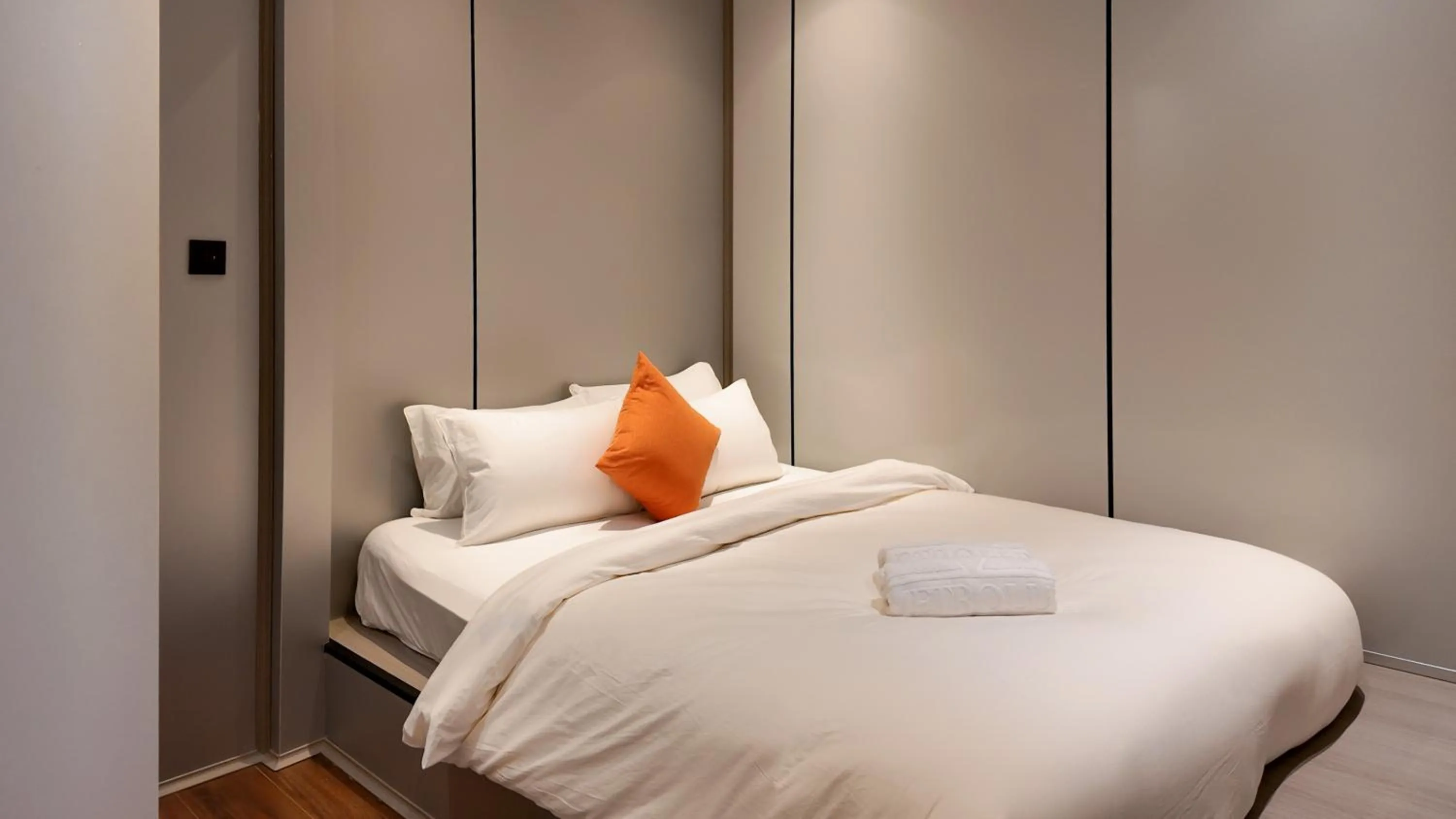 Bed in Metrolux City Contemporary Hotel