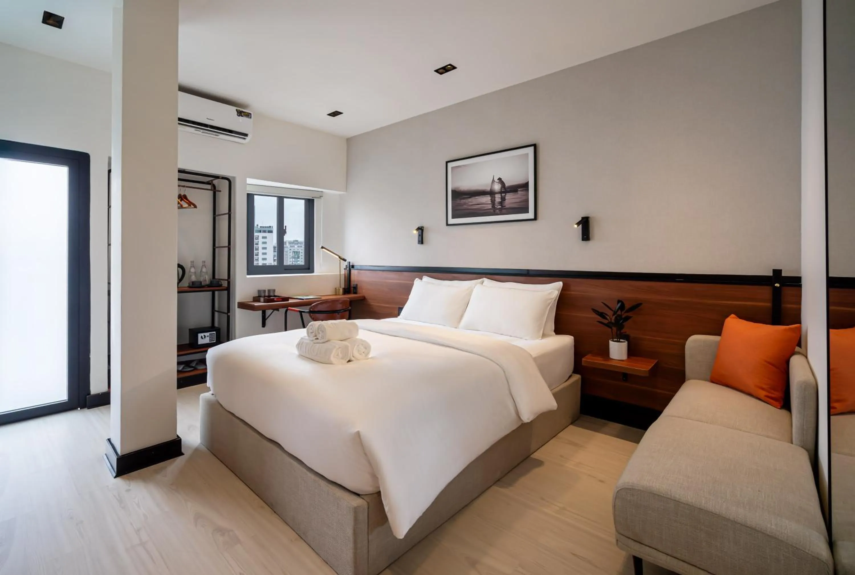 Bed in Metrolux City Contemporary Hotel