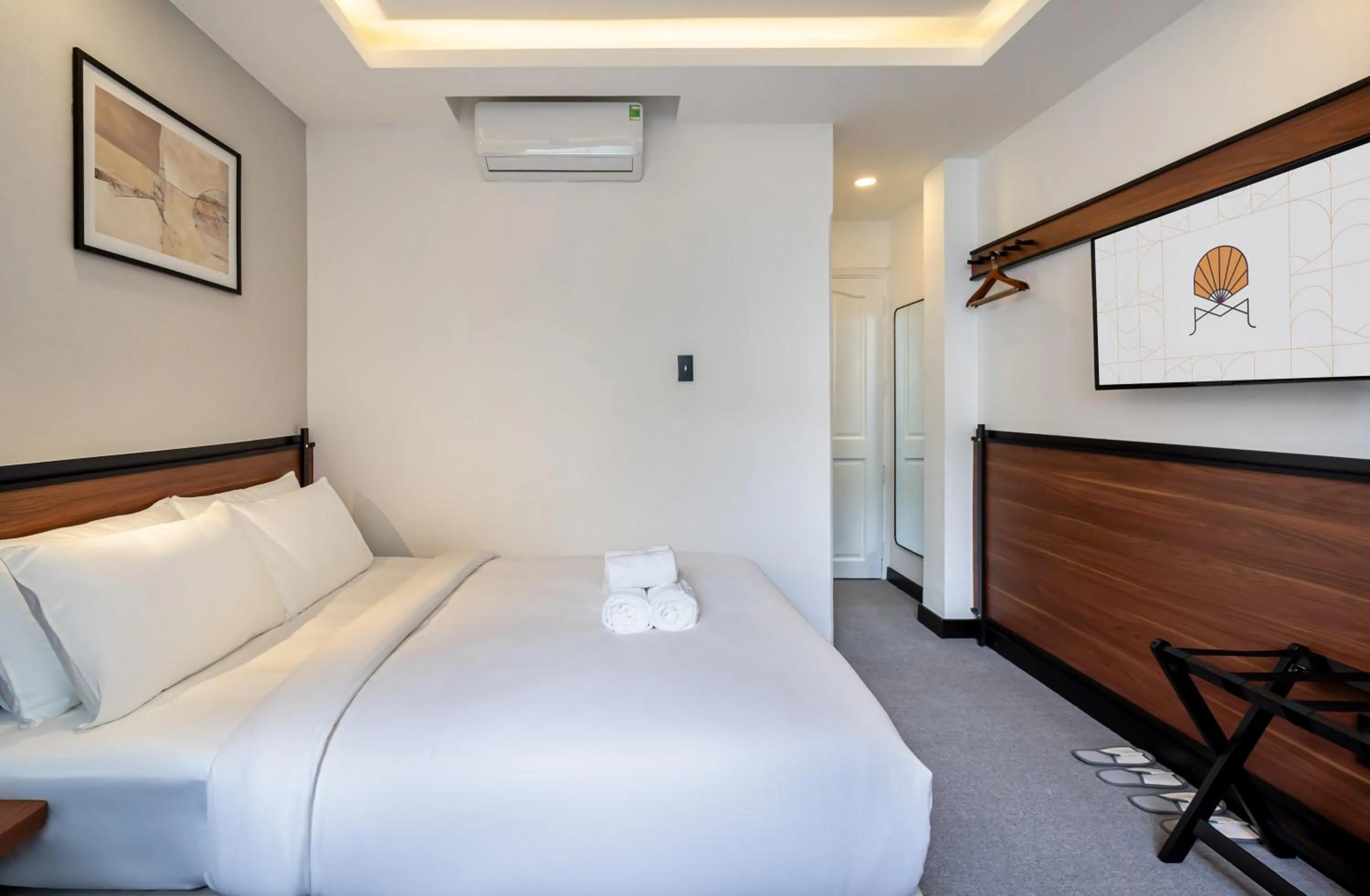 Bed in Metrolux City Contemporary Hotel