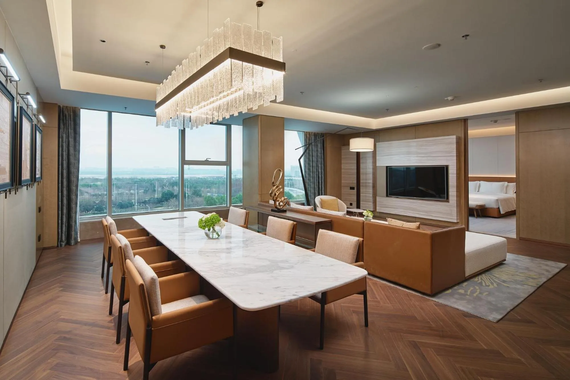 Living room in Crowne Plaza Wuhan Tianhe Airport by IHG