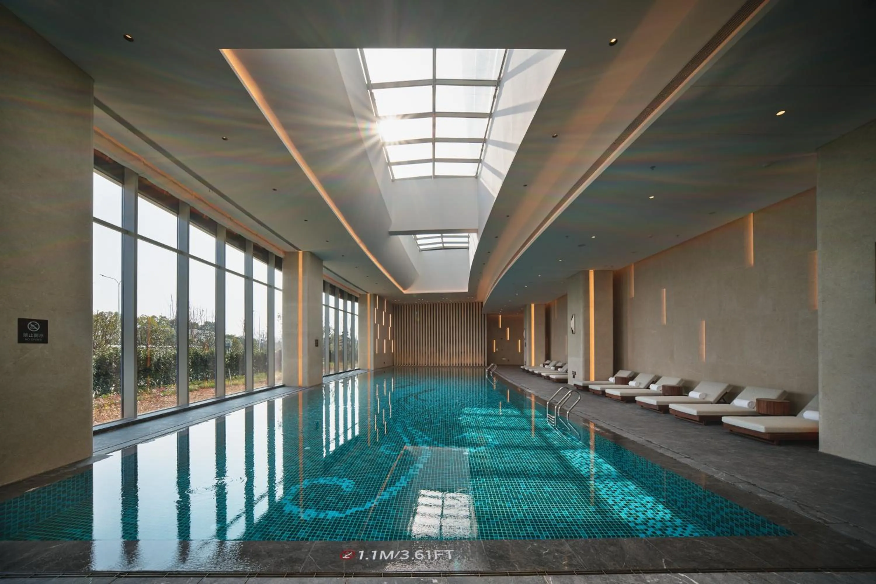 Swimming pool in Holiday Inn Wuhan Tianhe Airport by IHG