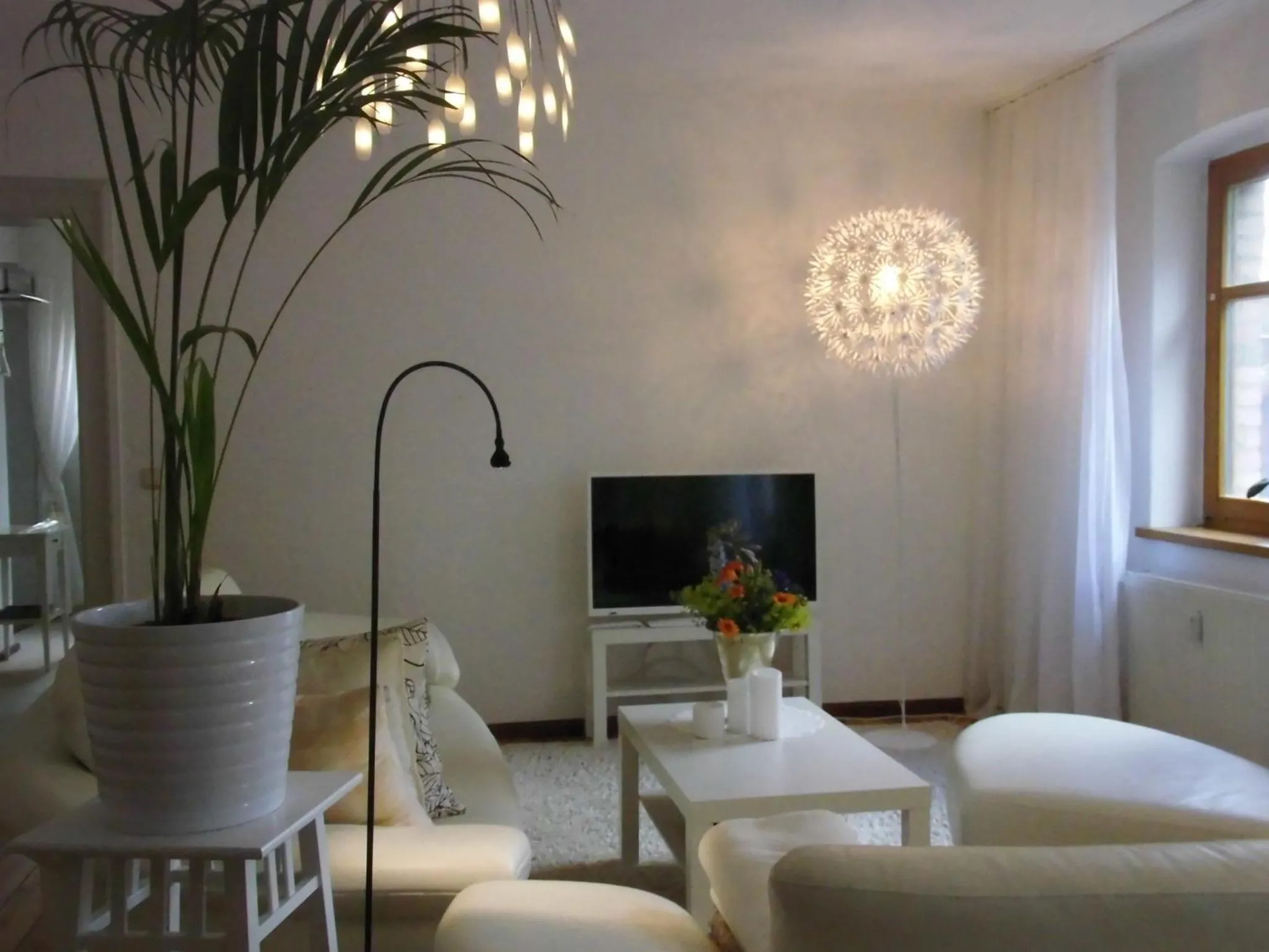 Living room in SchlossparkFerienwohnungen Rheinsberg mit Garten