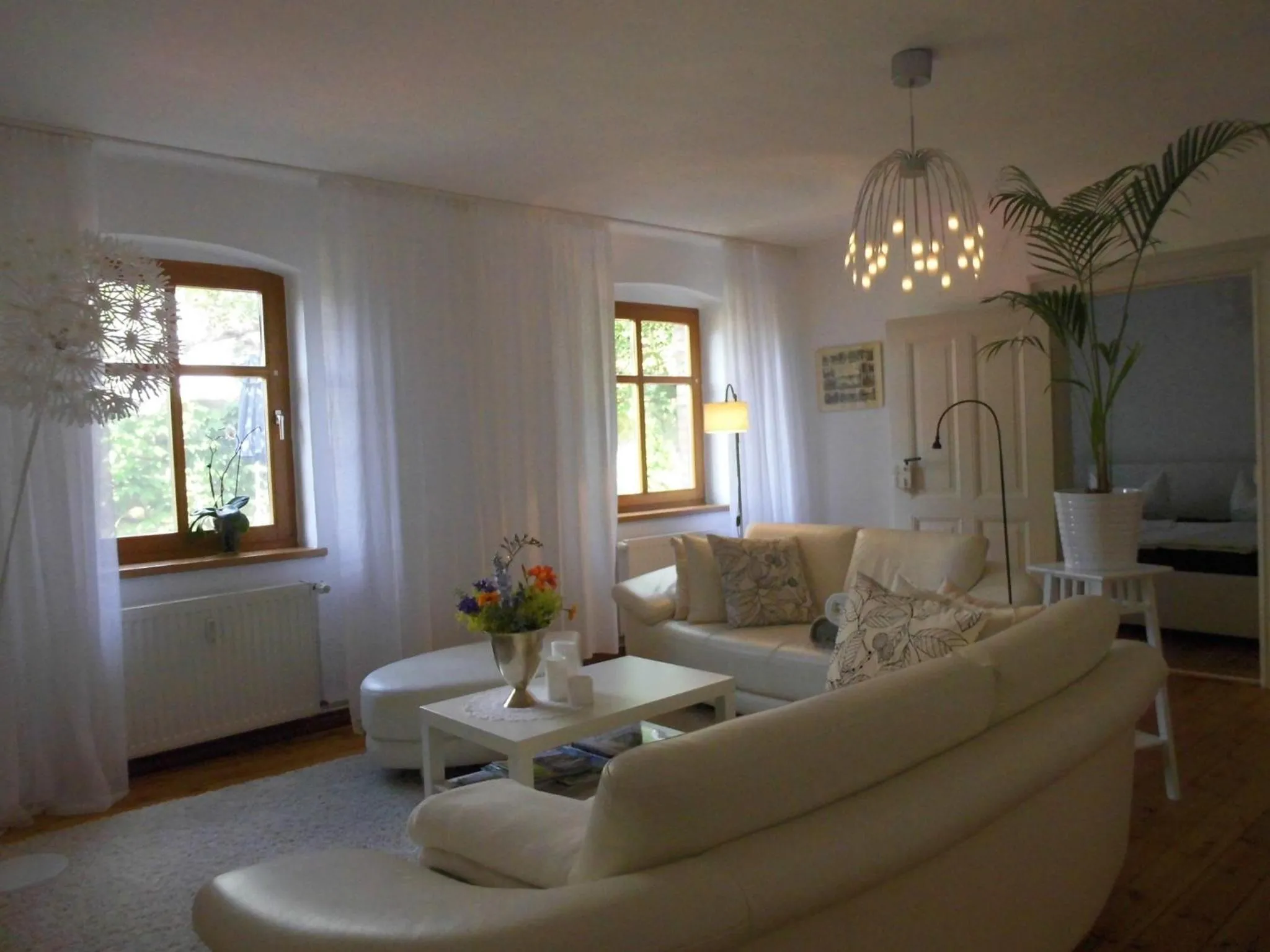 Living room in SchlossparkFerienwohnungen Rheinsberg mit Garten