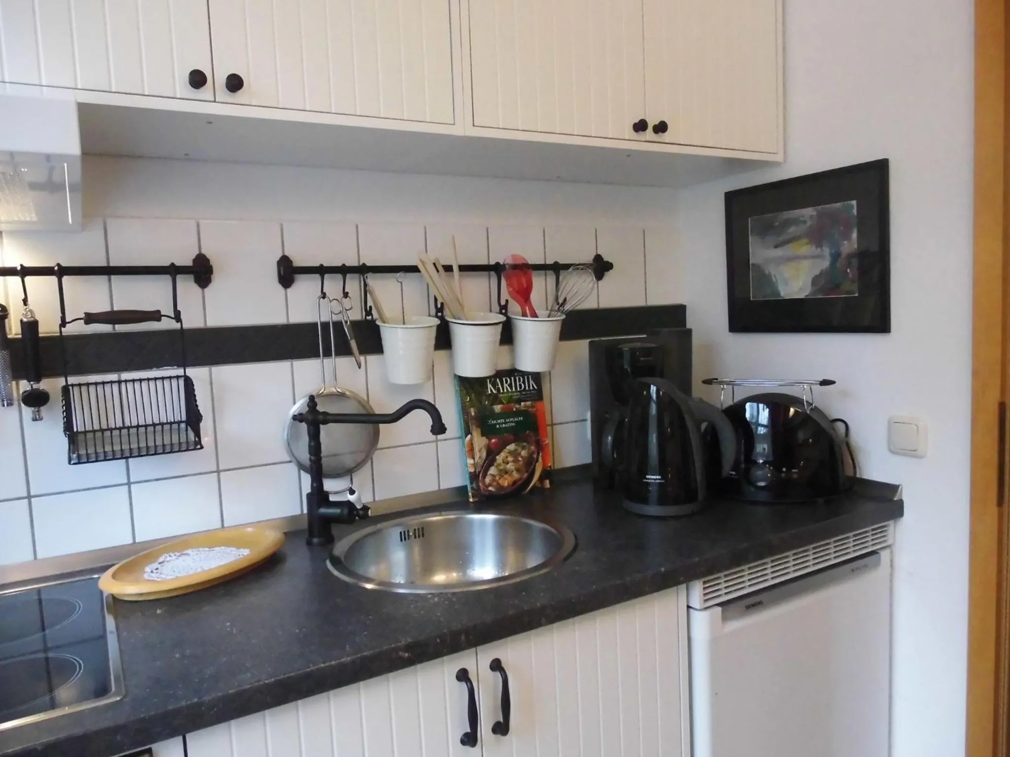 Kitchen or kitchenette in SchlossparkFerienwohnungen Rheinsberg mit Garten