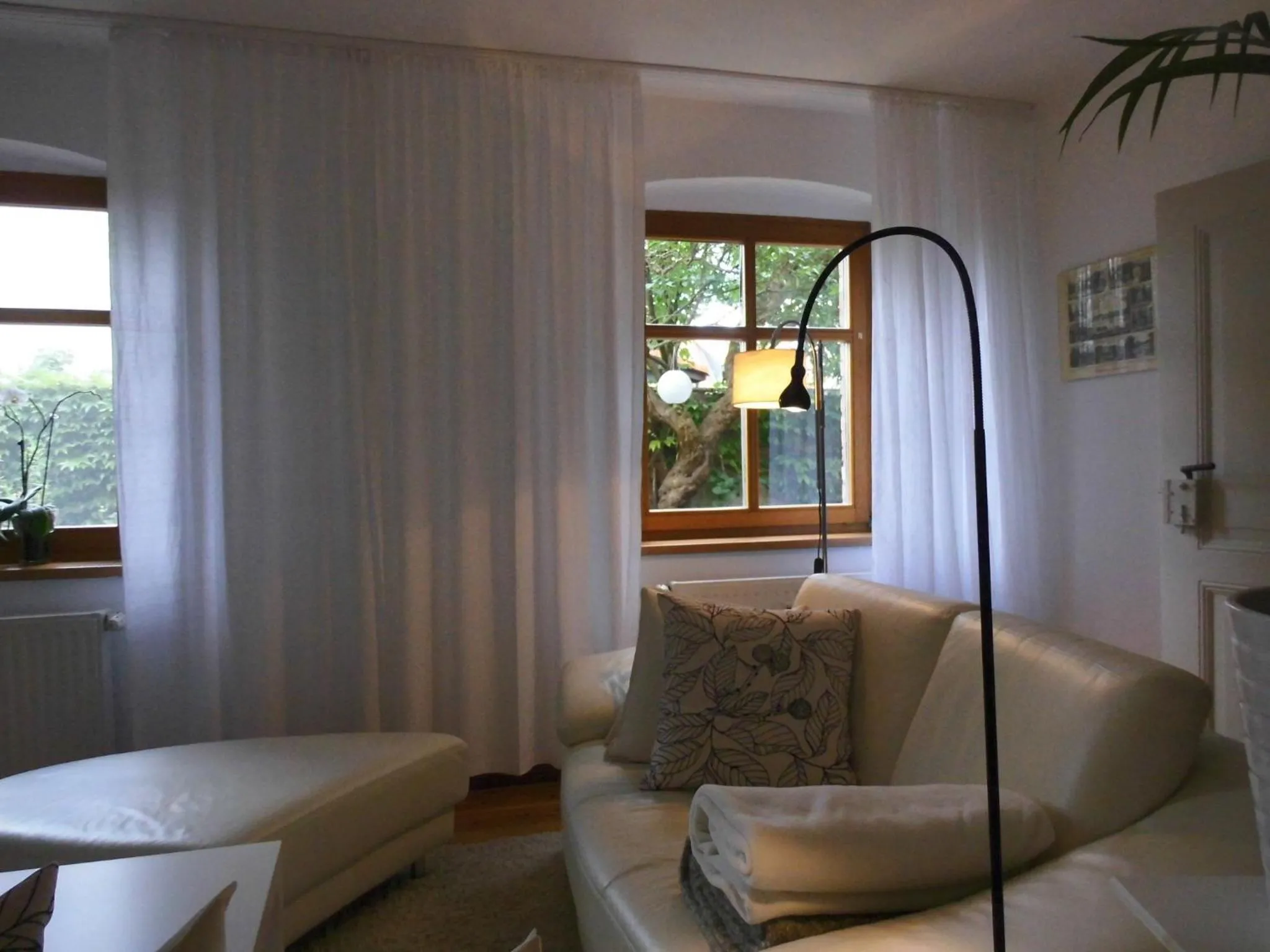 Living room in SchlossparkFerienwohnungen Rheinsberg mit Garten