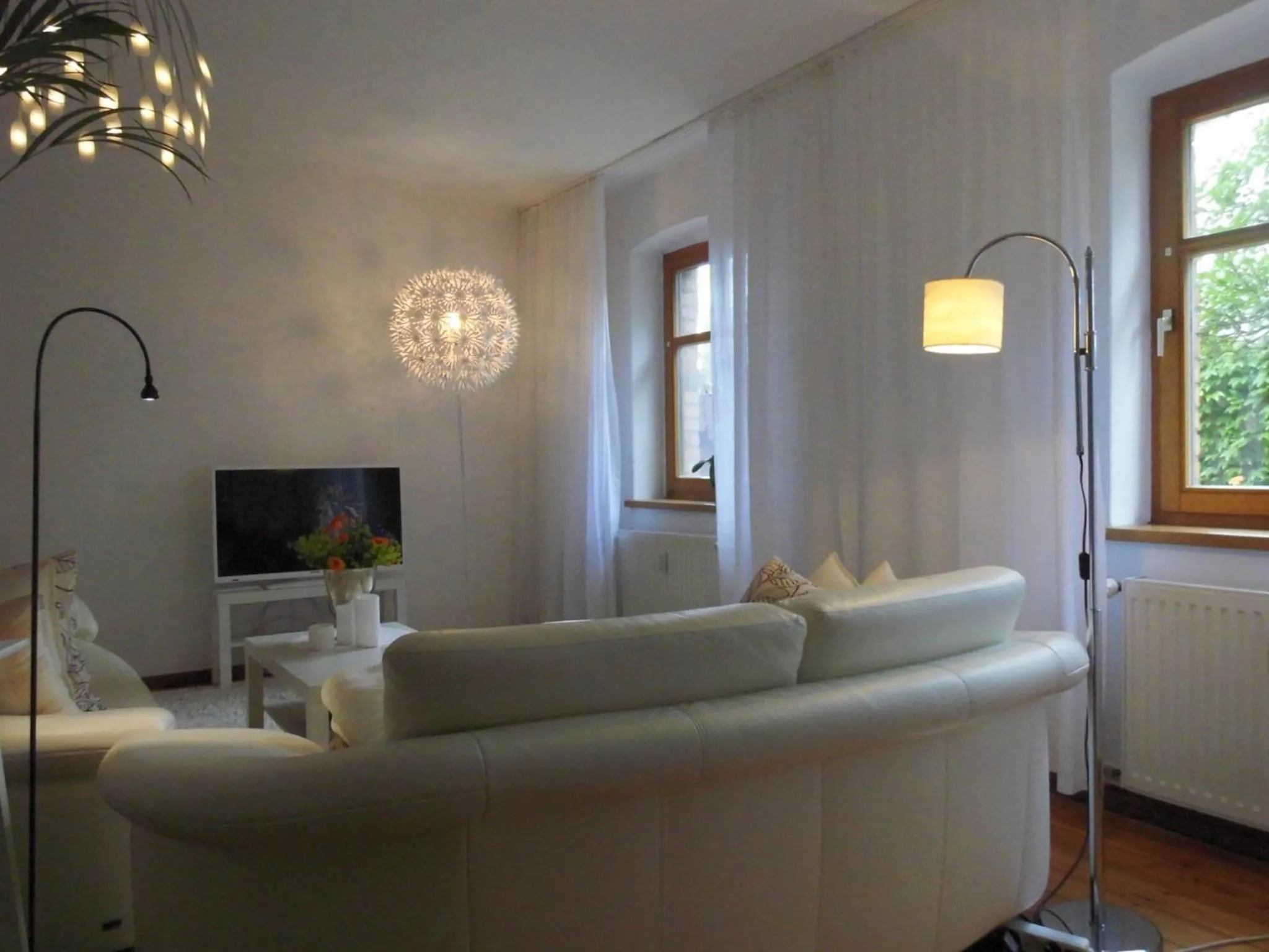 Living room in SchlossparkFerienwohnungen Rheinsberg mit Garten