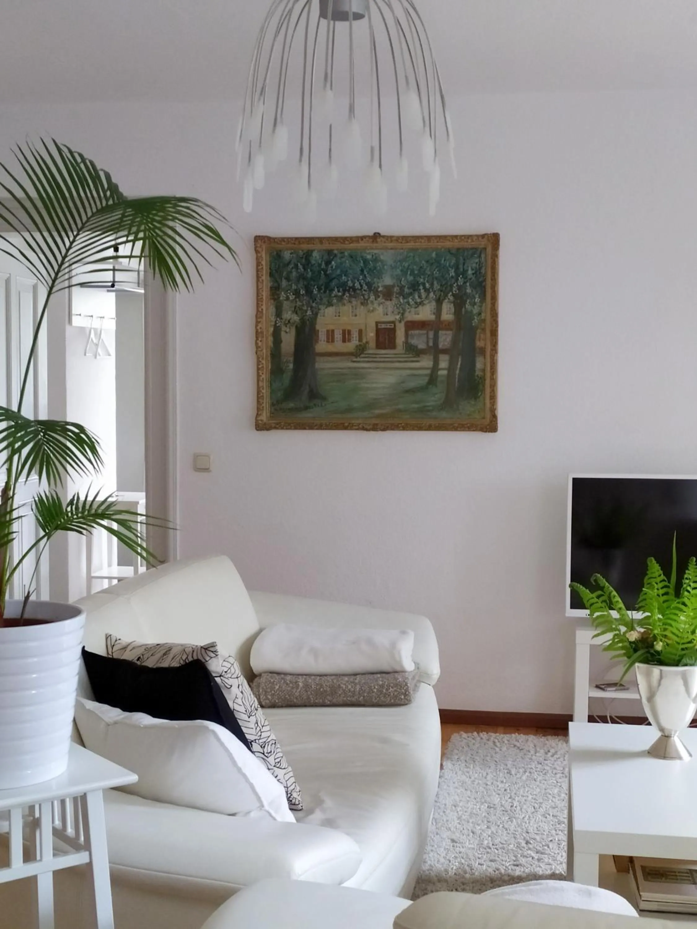 Living room in SchlossparkFerienwohnungen Rheinsberg mit Garten