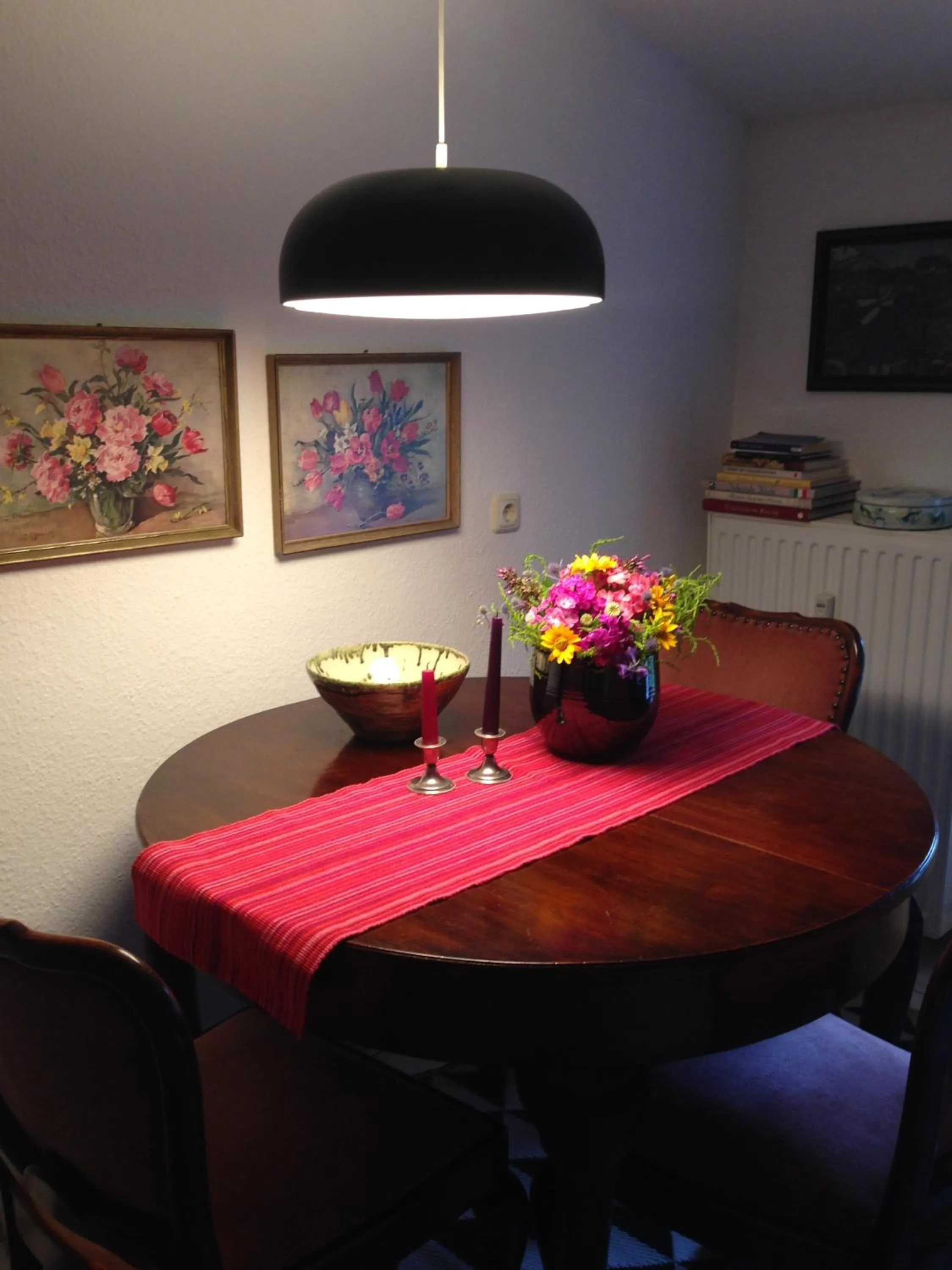 Dining area in SchlossparkFerienwohnungen Rheinsberg mit Garten