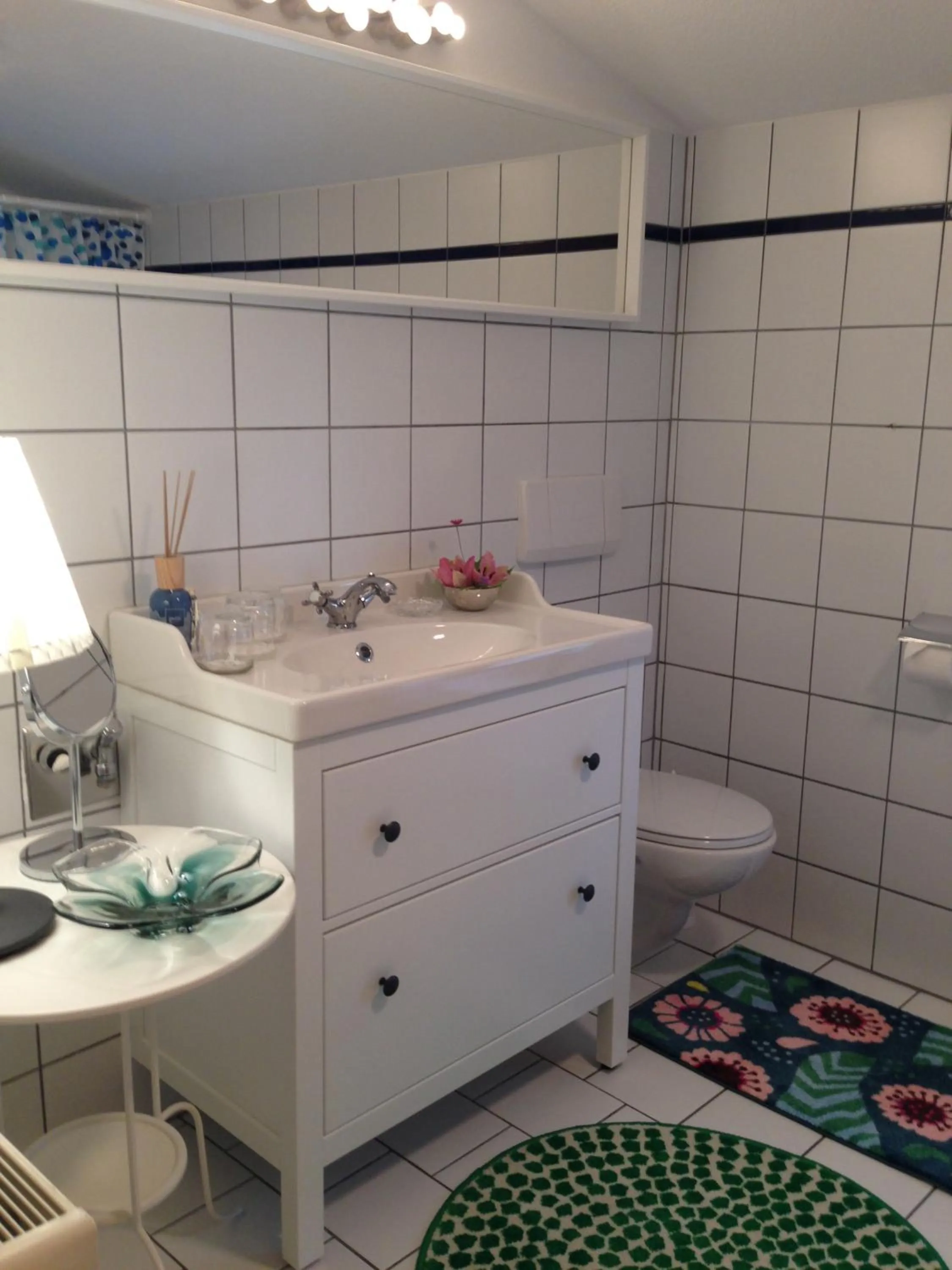 Bathroom in SchlossparkFerienwohnungen Rheinsberg mit Garten