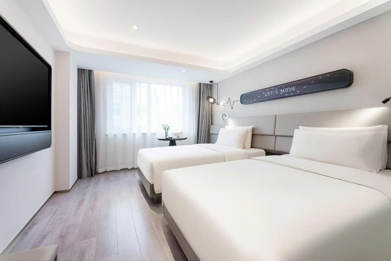 Photo of the whole room, Bed in Atour Light Hotel Dalian Xinghai Square Hang Lung Shopping Center