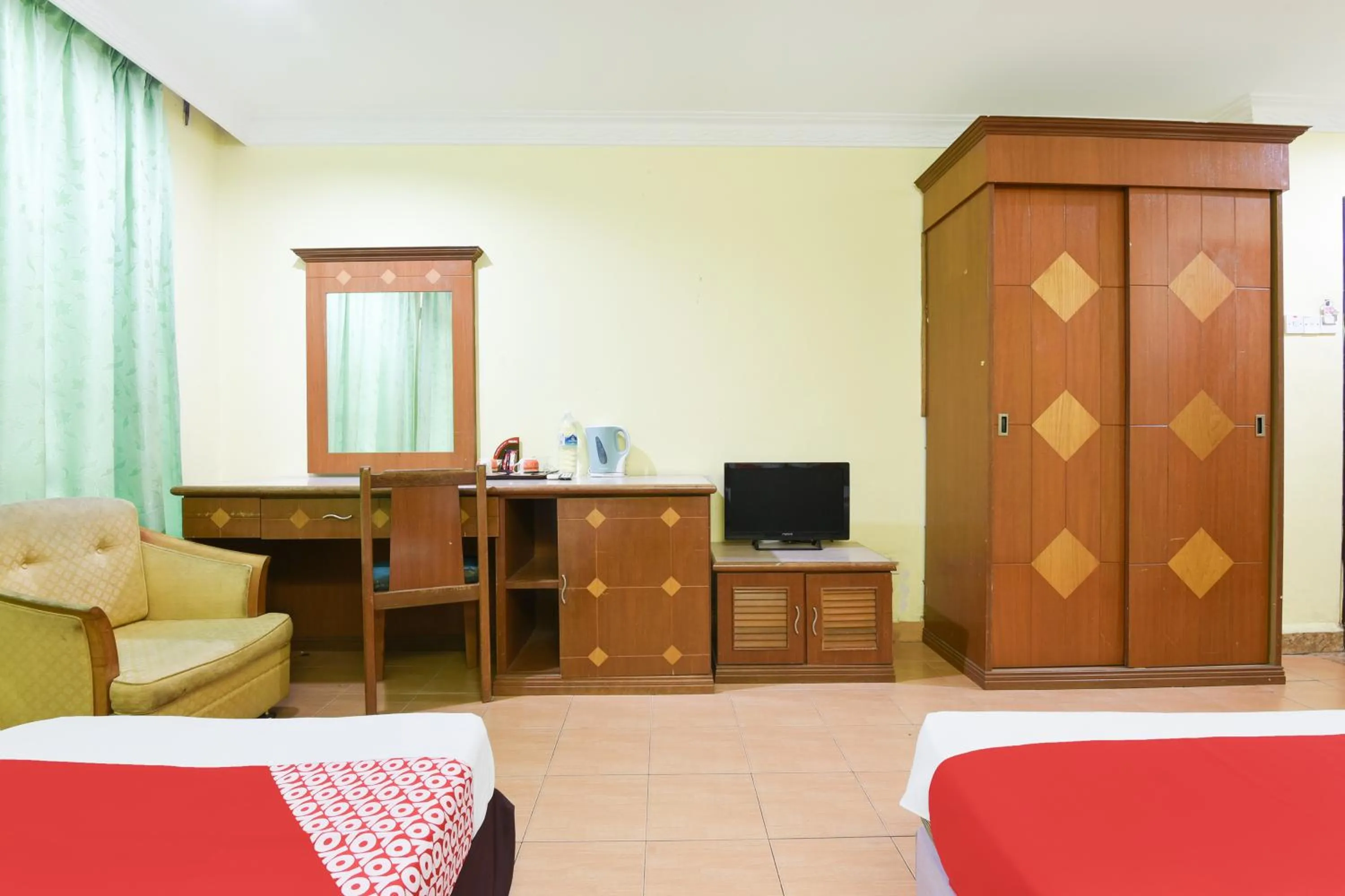 Bedroom in Hotel O Kota Bharu Near War Museum Formerly Azam Hotel