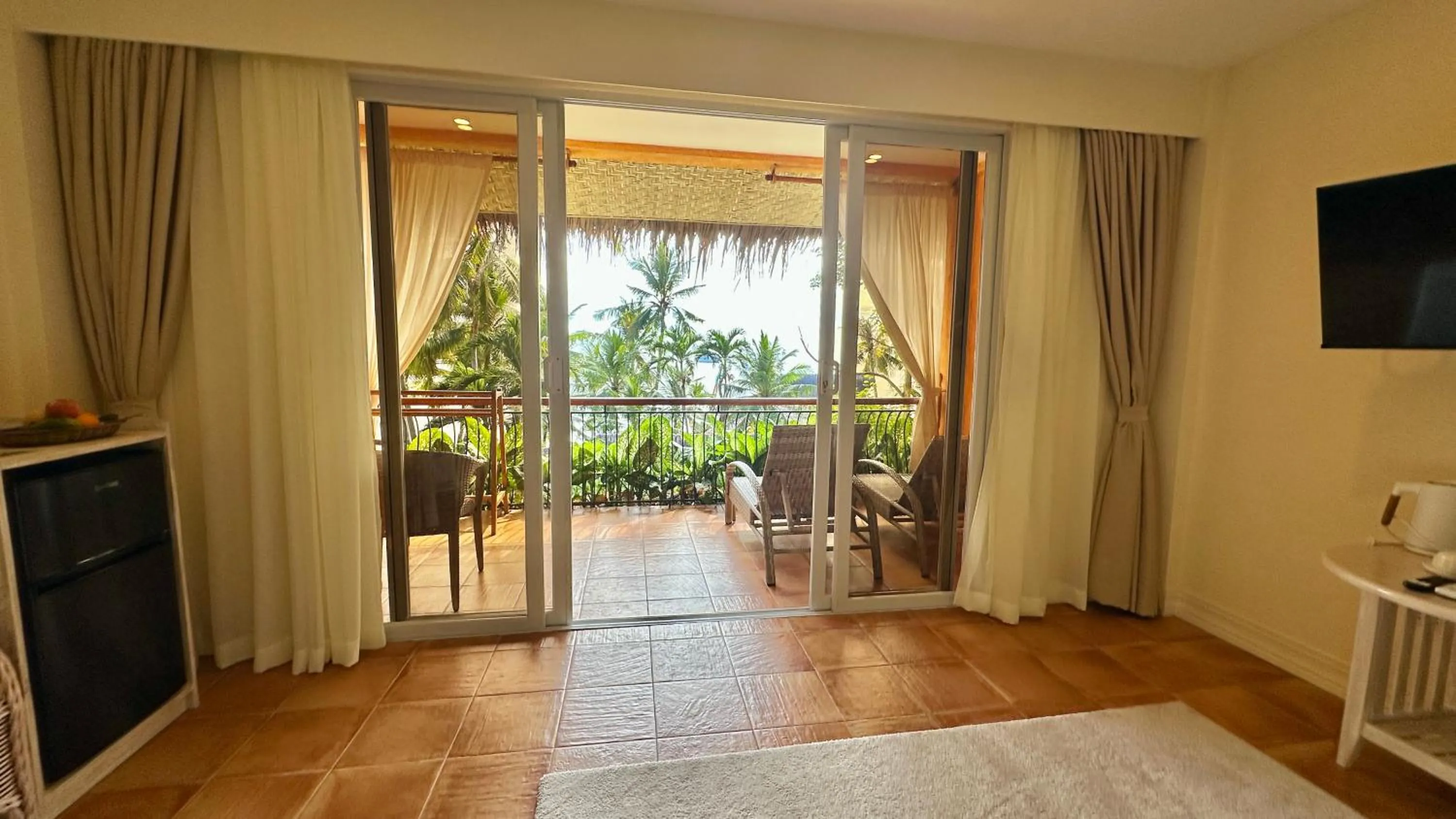 Balcony/Terrace, Bed in Coco Sunset Beach Resort