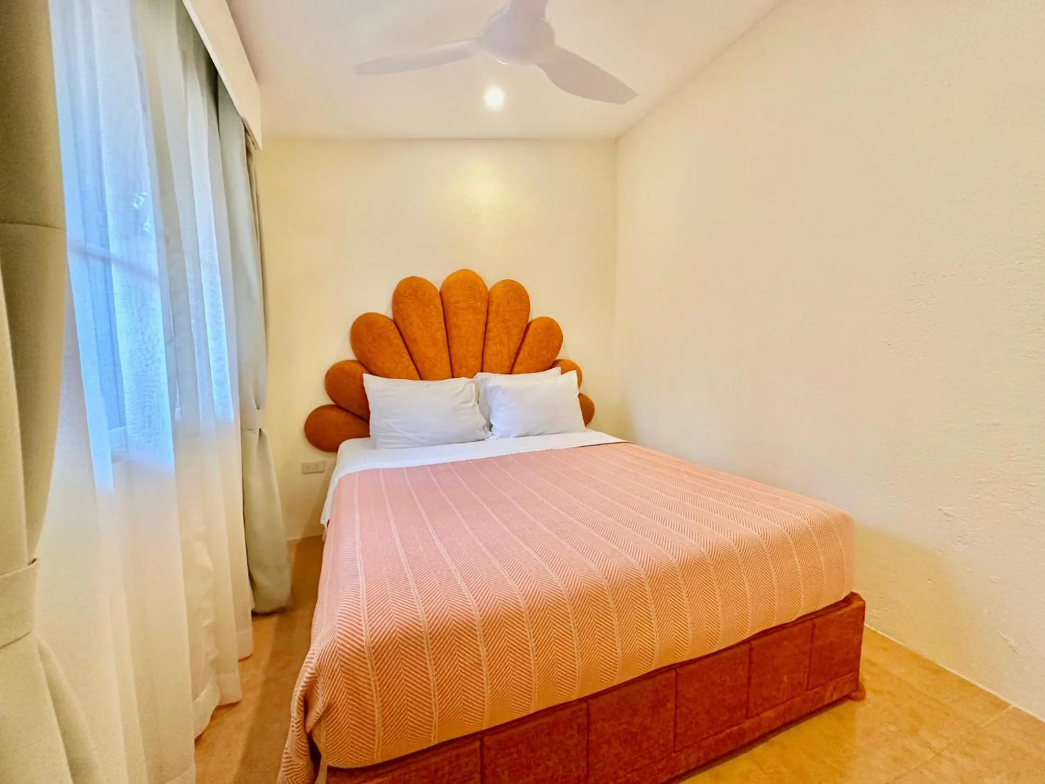 Bed in Coco Sunset Beach Resort