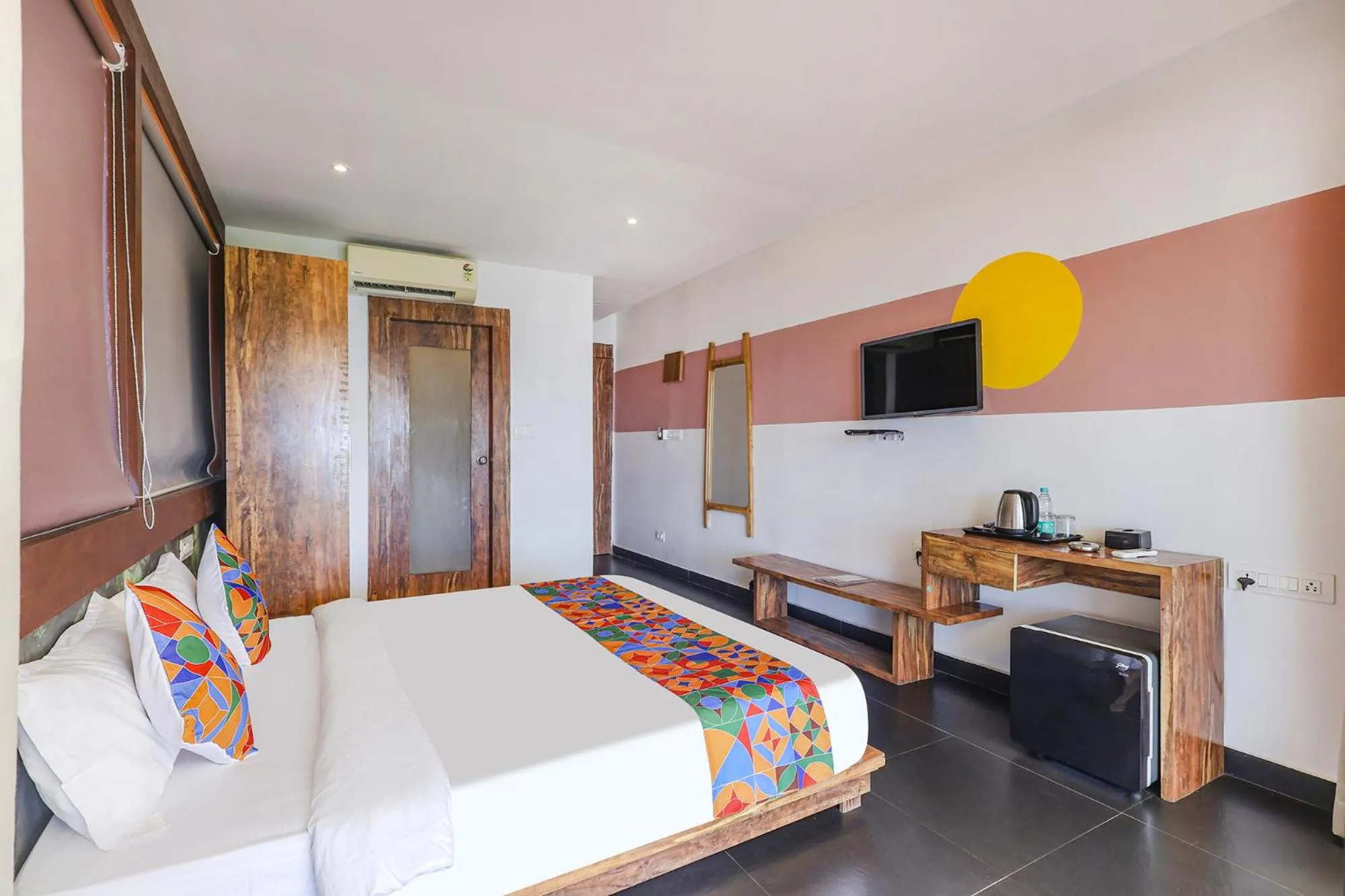 Bed in FabHotel Hillora Coastal Resort