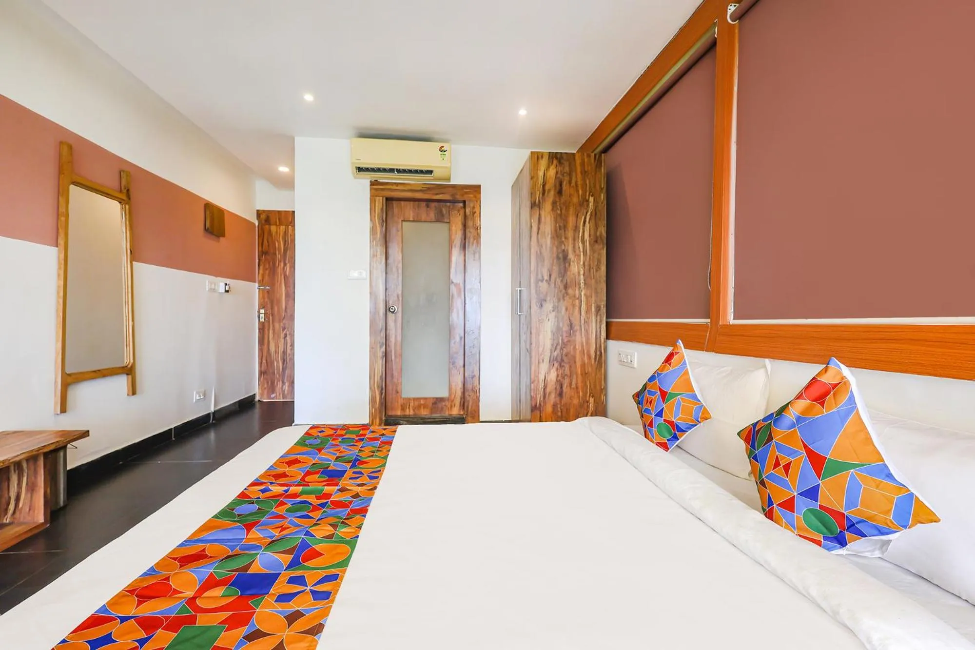 Bed in FabHotel Hillora Coastal Resort