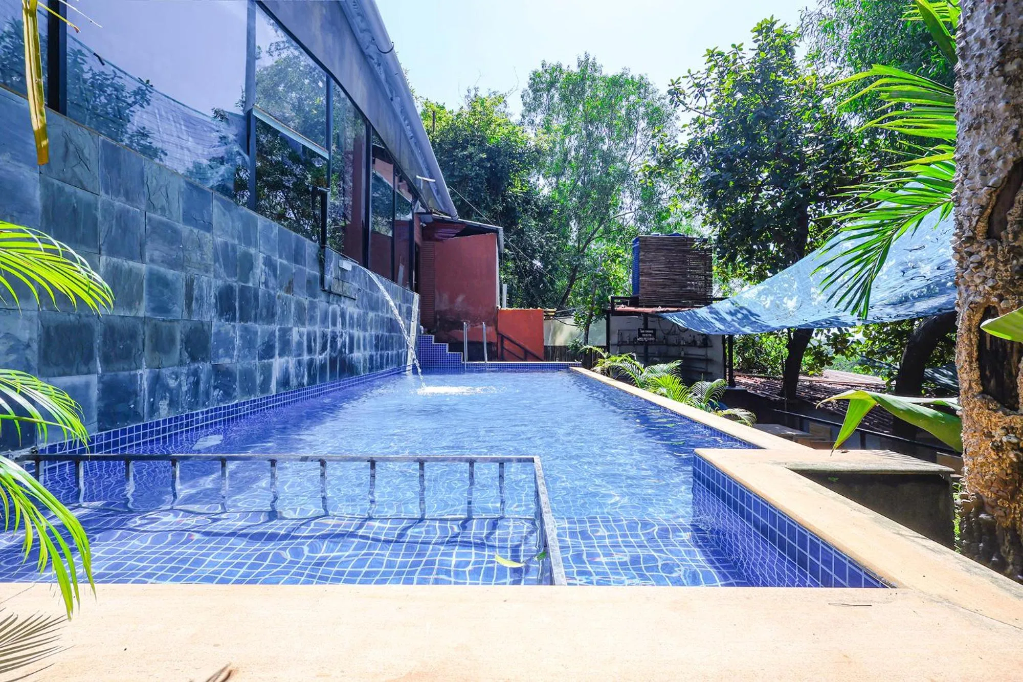 Swimming pool in FabHotel Hillora Coastal Resort