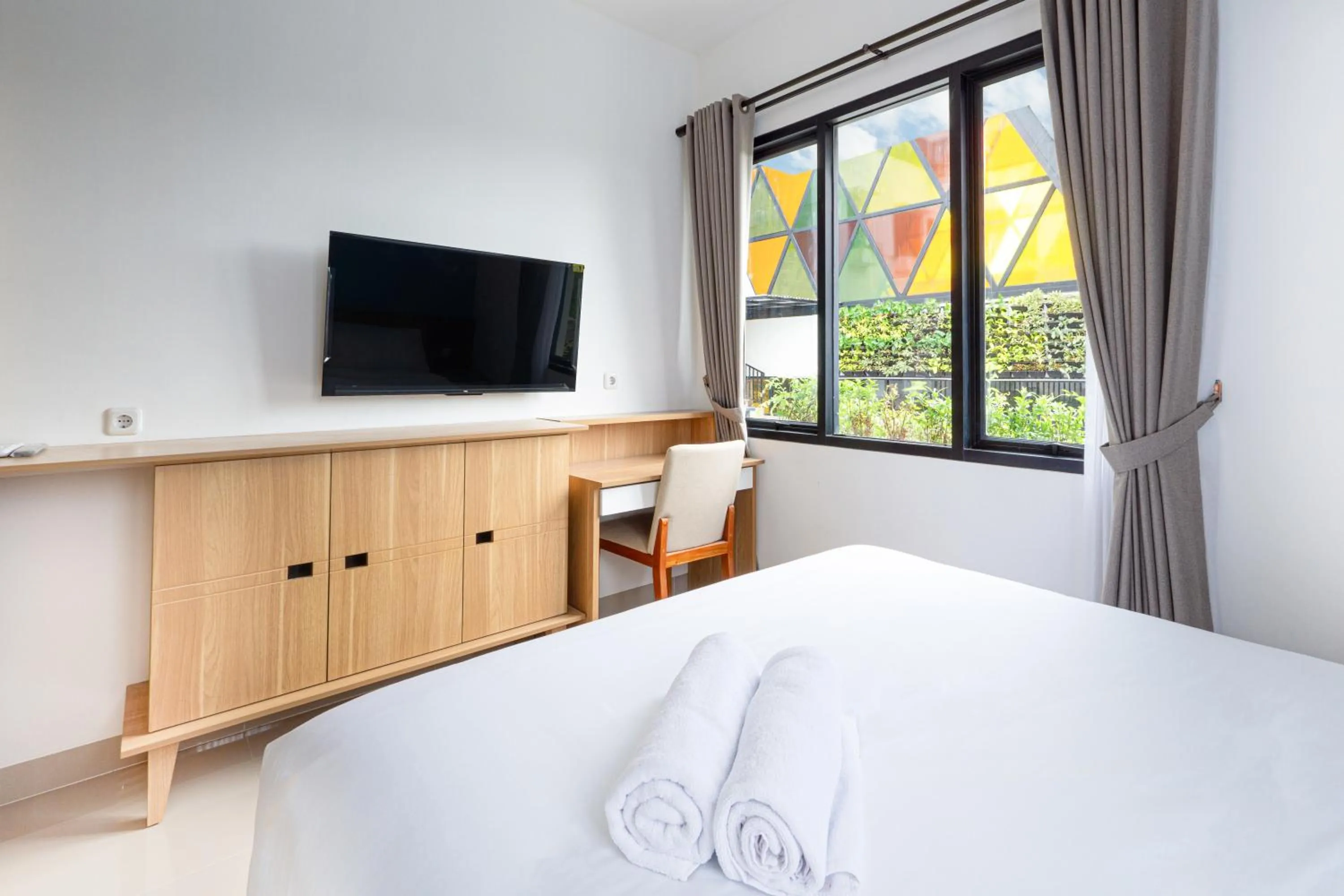 Bed in Svarnabumi Hotel