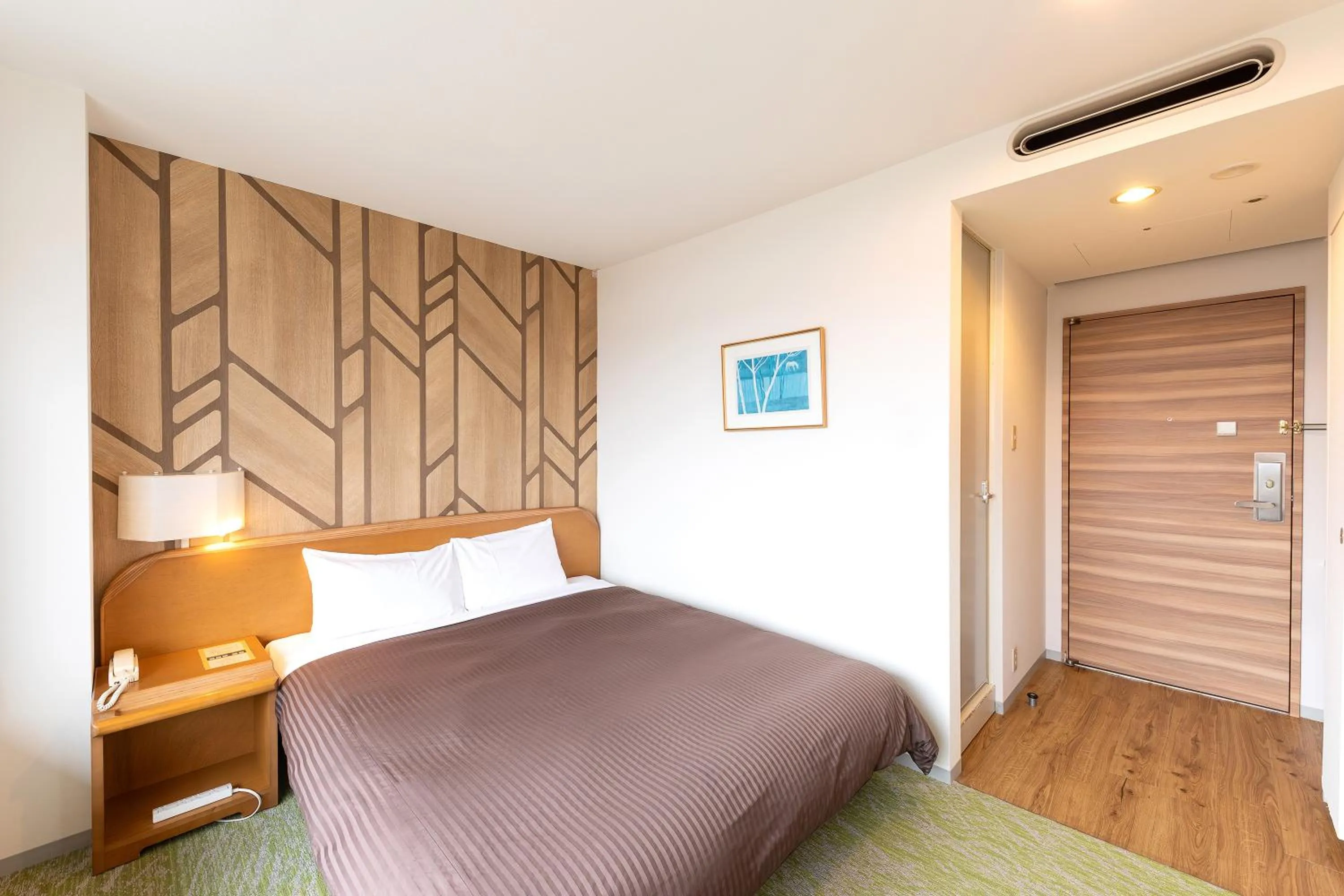 Bed in Kitahiroshima Classe Hotel