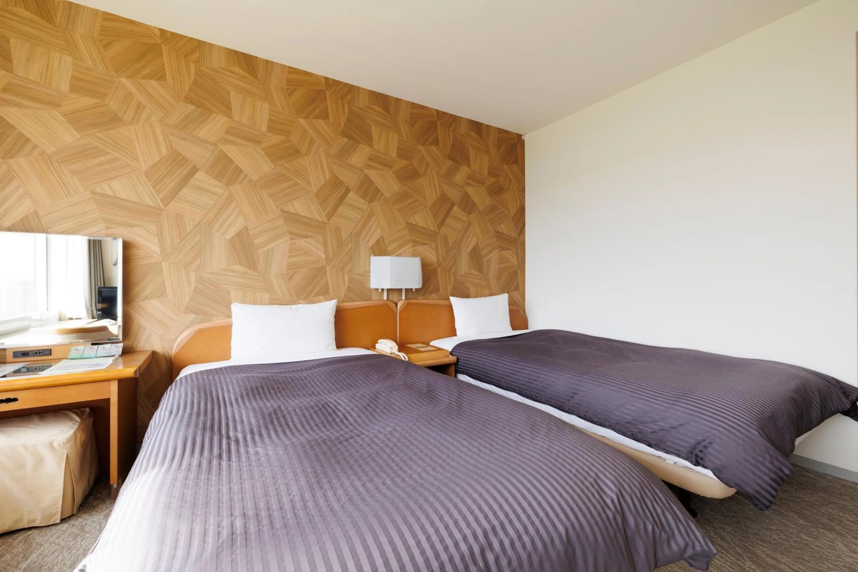 Bed in Kitahiroshima Classe Hotel