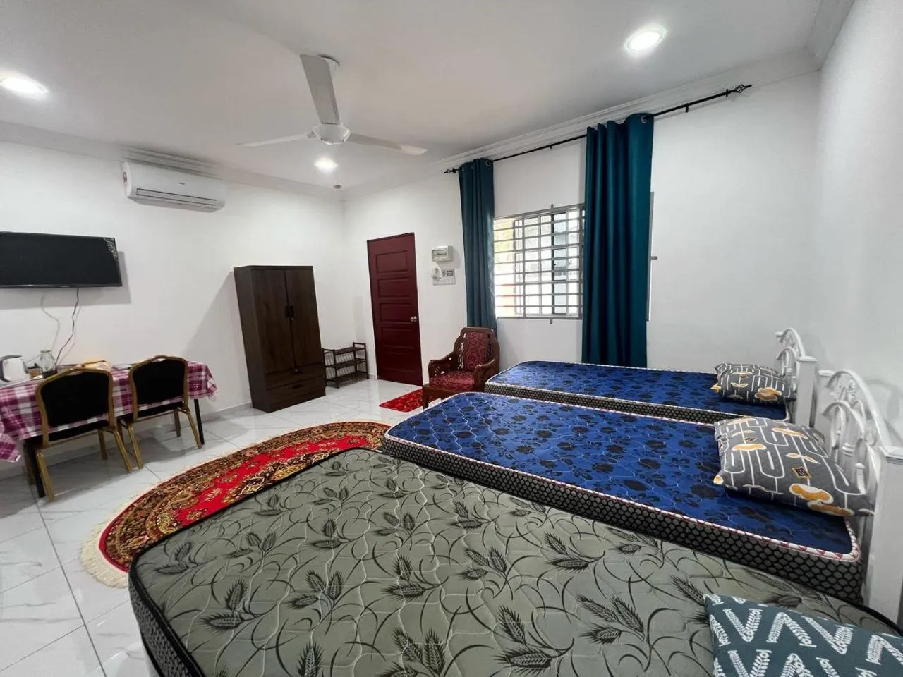 Bedroom in Capital O 91117 Noor Room Stay