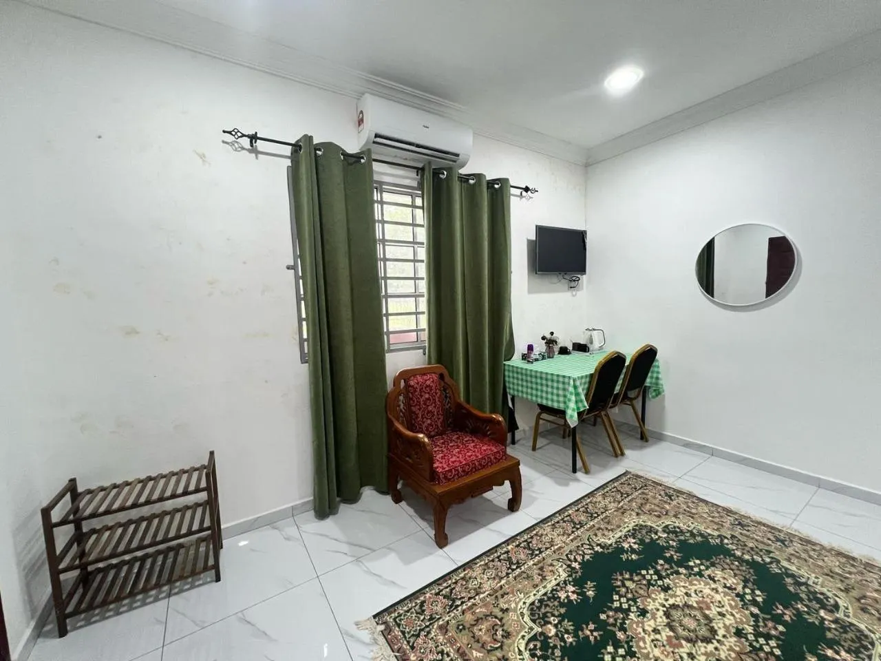 Bedroom in Capital O 91117 Noor Room Stay