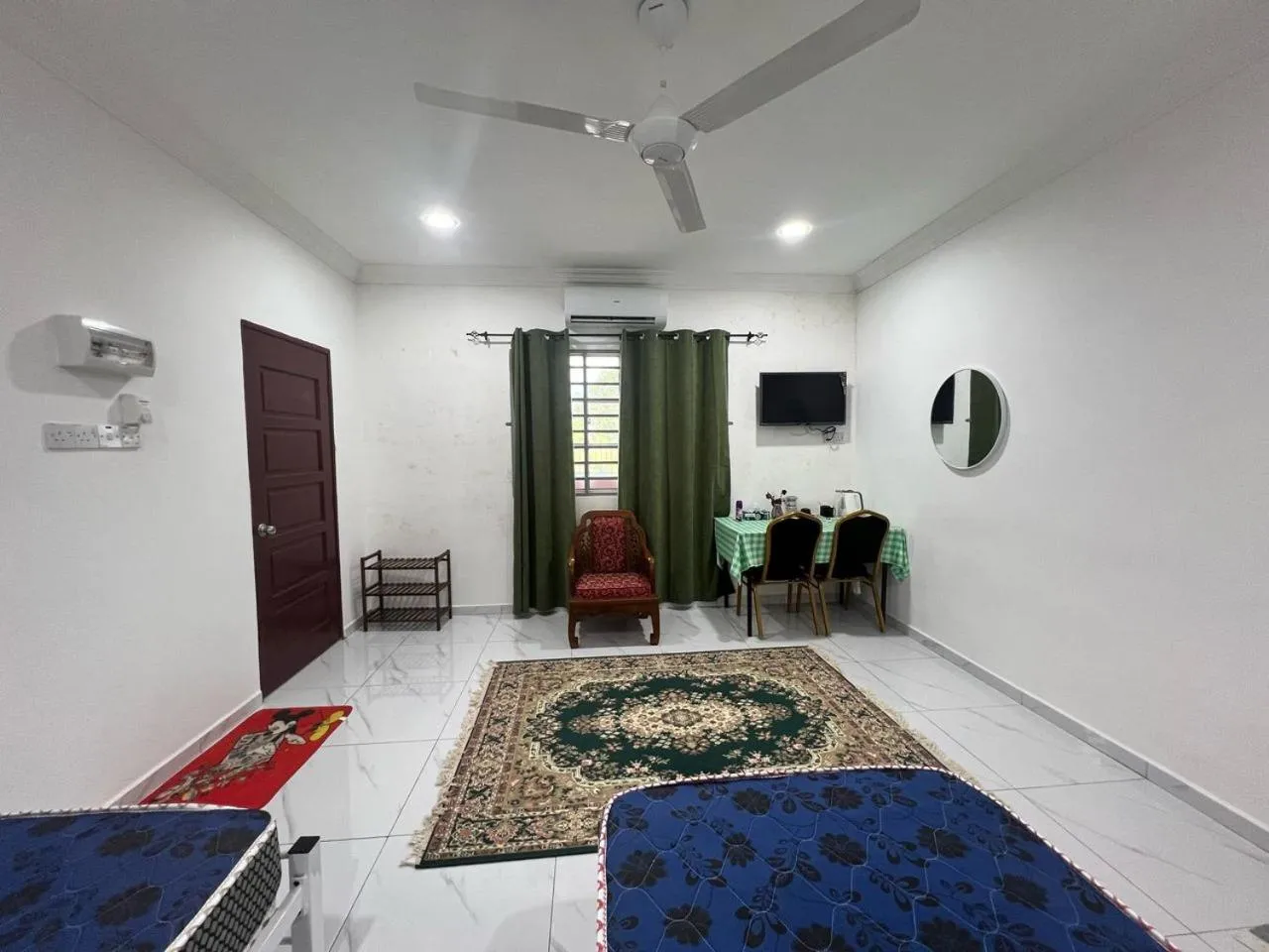 Bedroom in Capital O 91117 Noor Room Stay