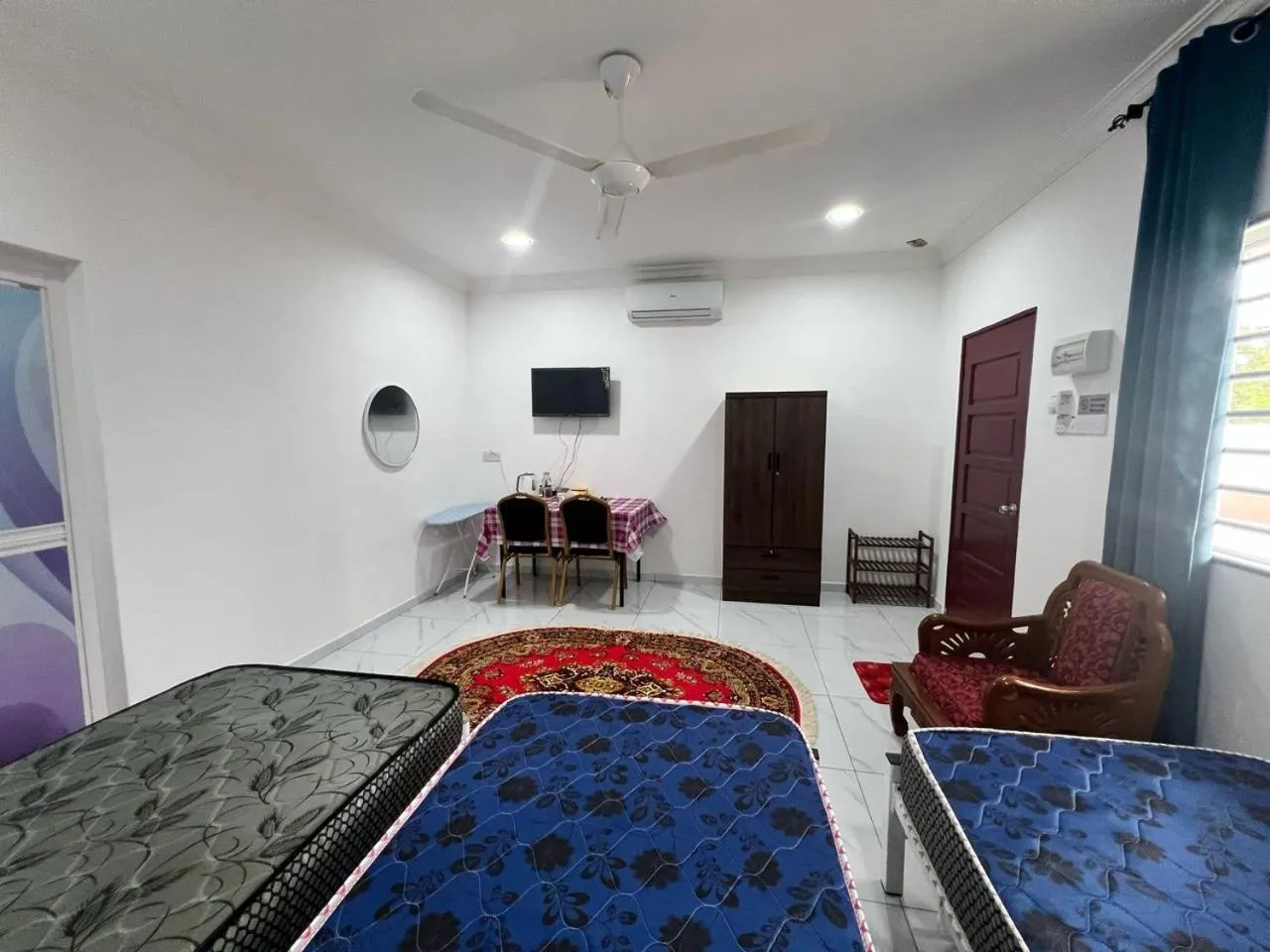 Bedroom in Capital O 91117 Noor Room Stay