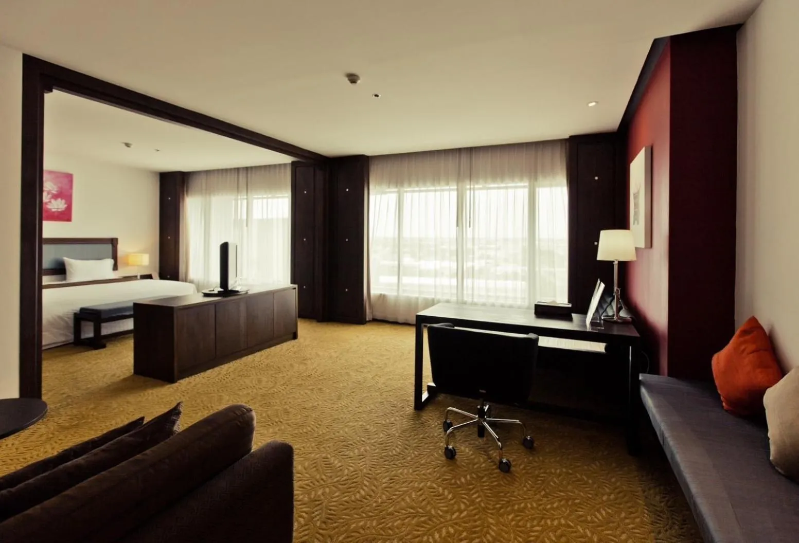 Photo of the whole room, Bed in Sunee Grand Hotel and Convention Center