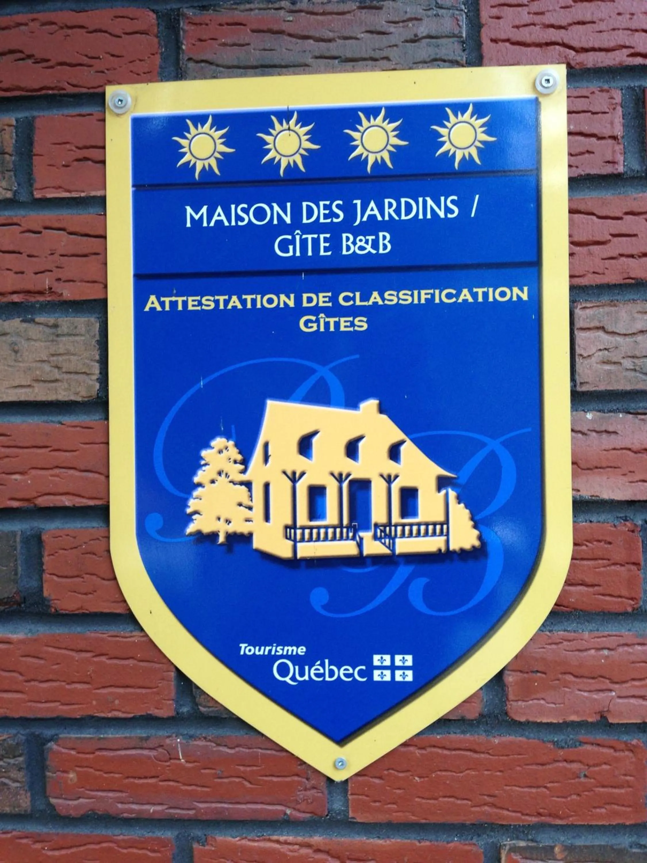 Property logo or sign in Maison Des Jardins B & B