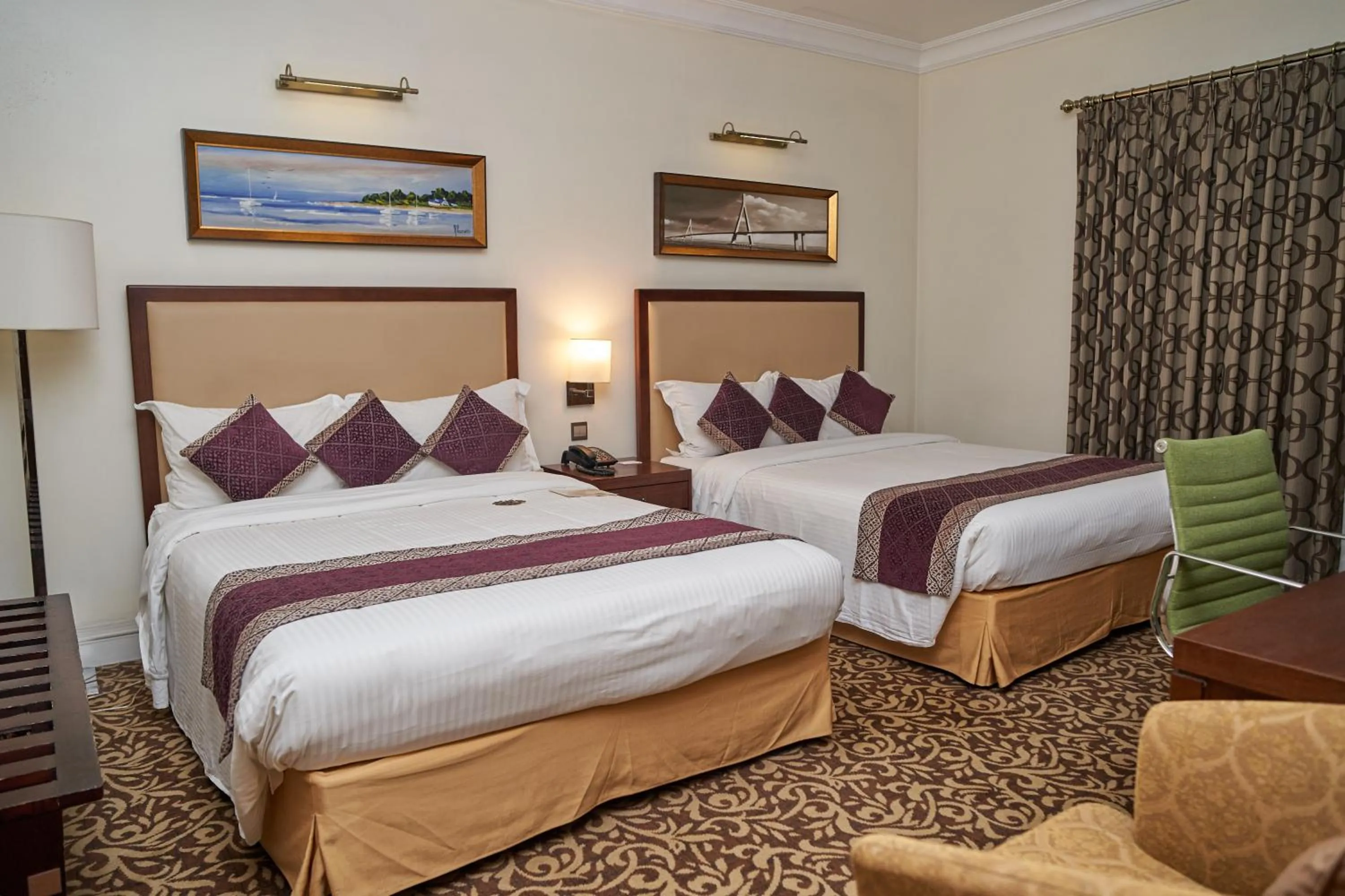 Bed in Royal Park Residence Hotel