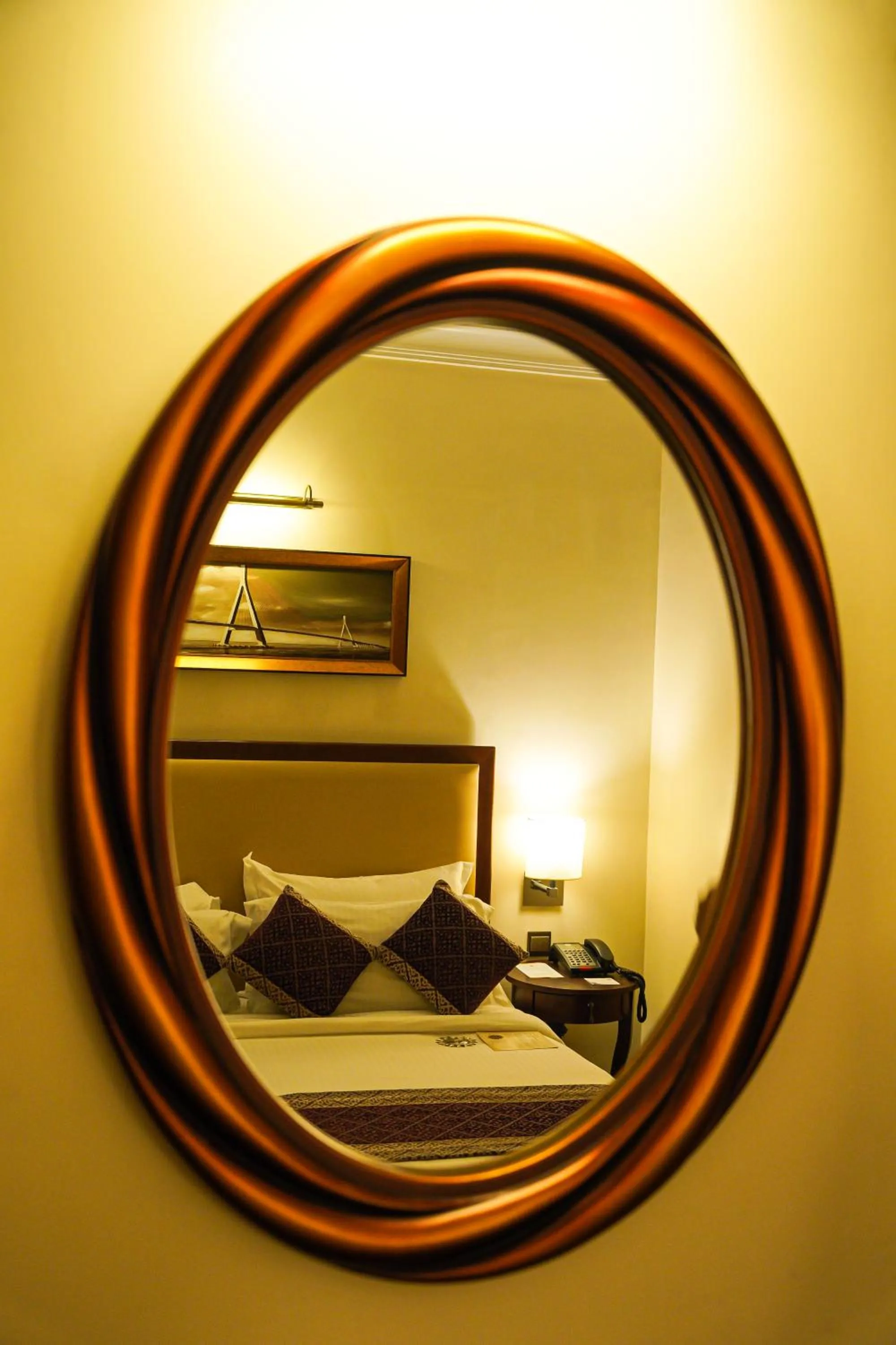 Bed in Royal Park Residence Hotel