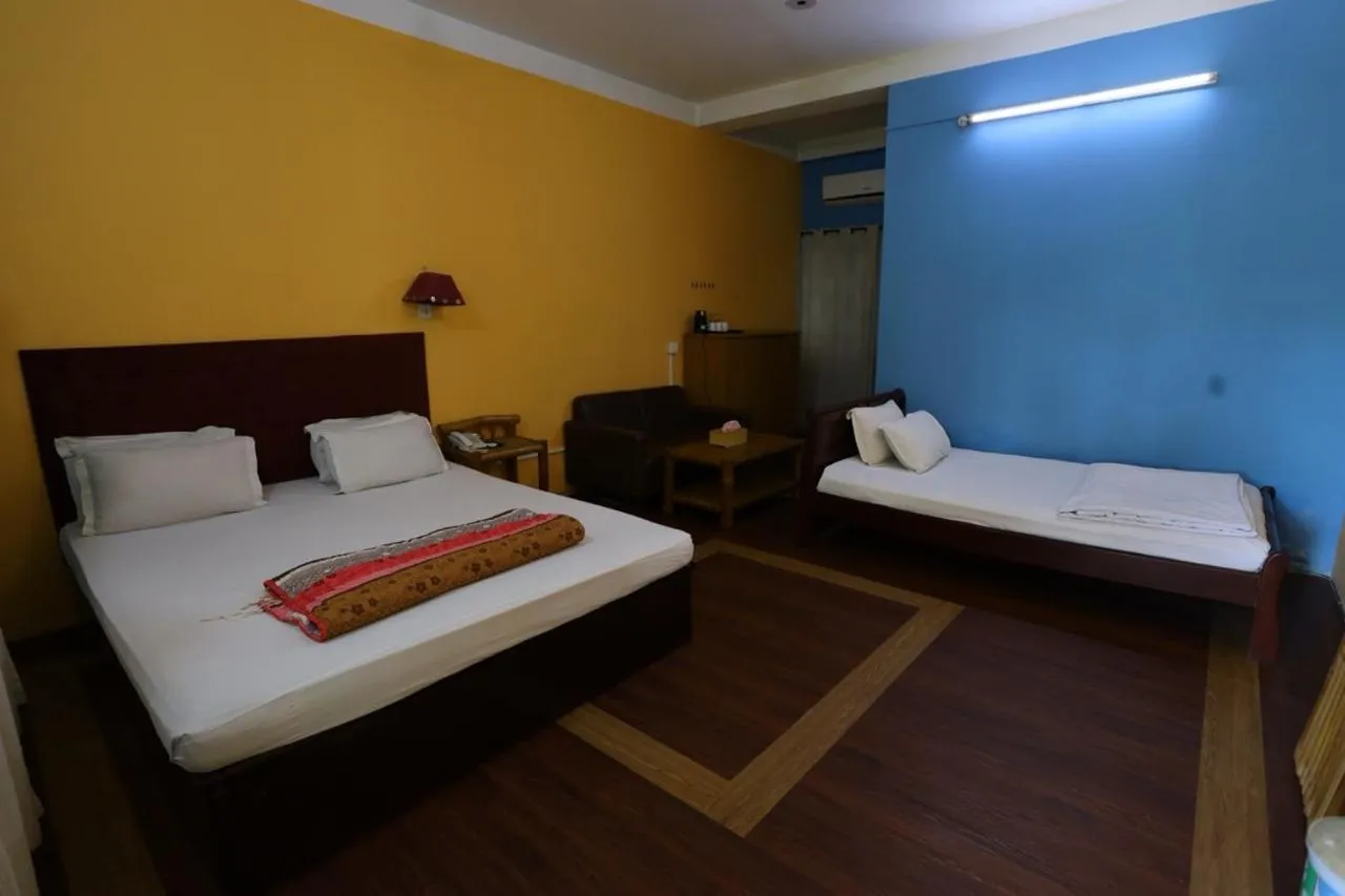 Deluxe Triple Room in Rangauti Resort