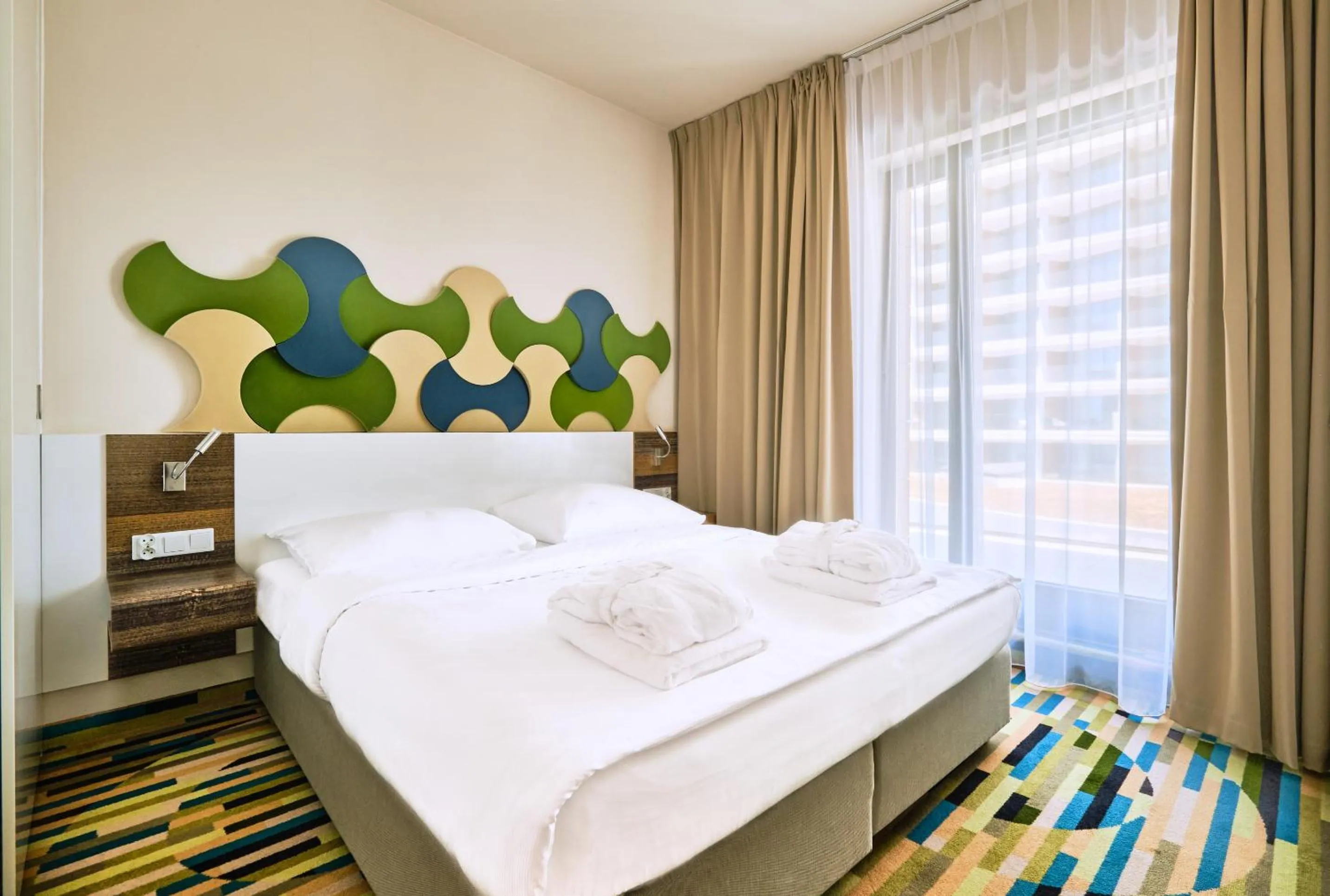 Bed in Baltic Park Molo Apartments by Zdrojowa