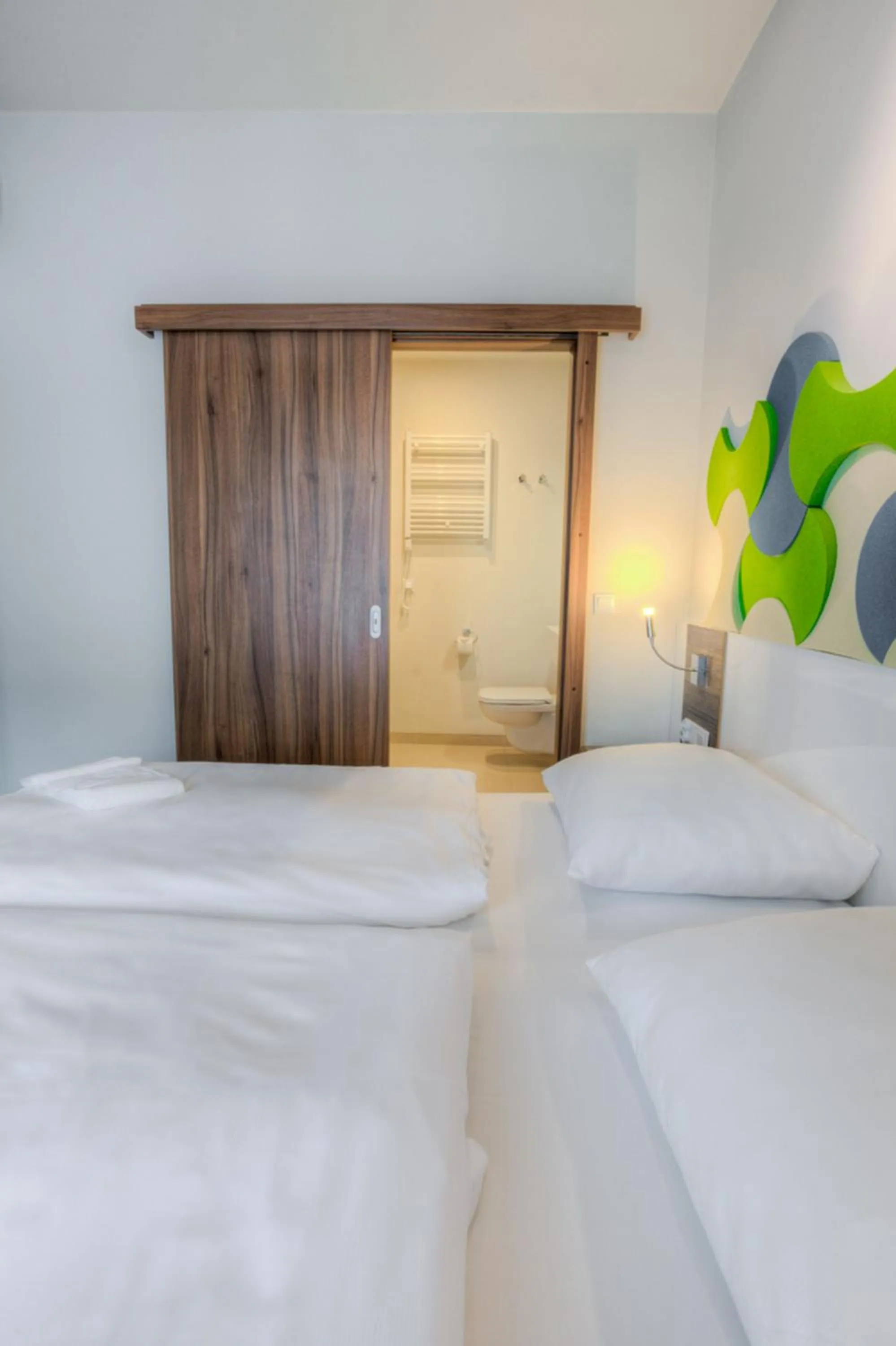 Bed in Baltic Park Molo Apartments by Zdrojowa