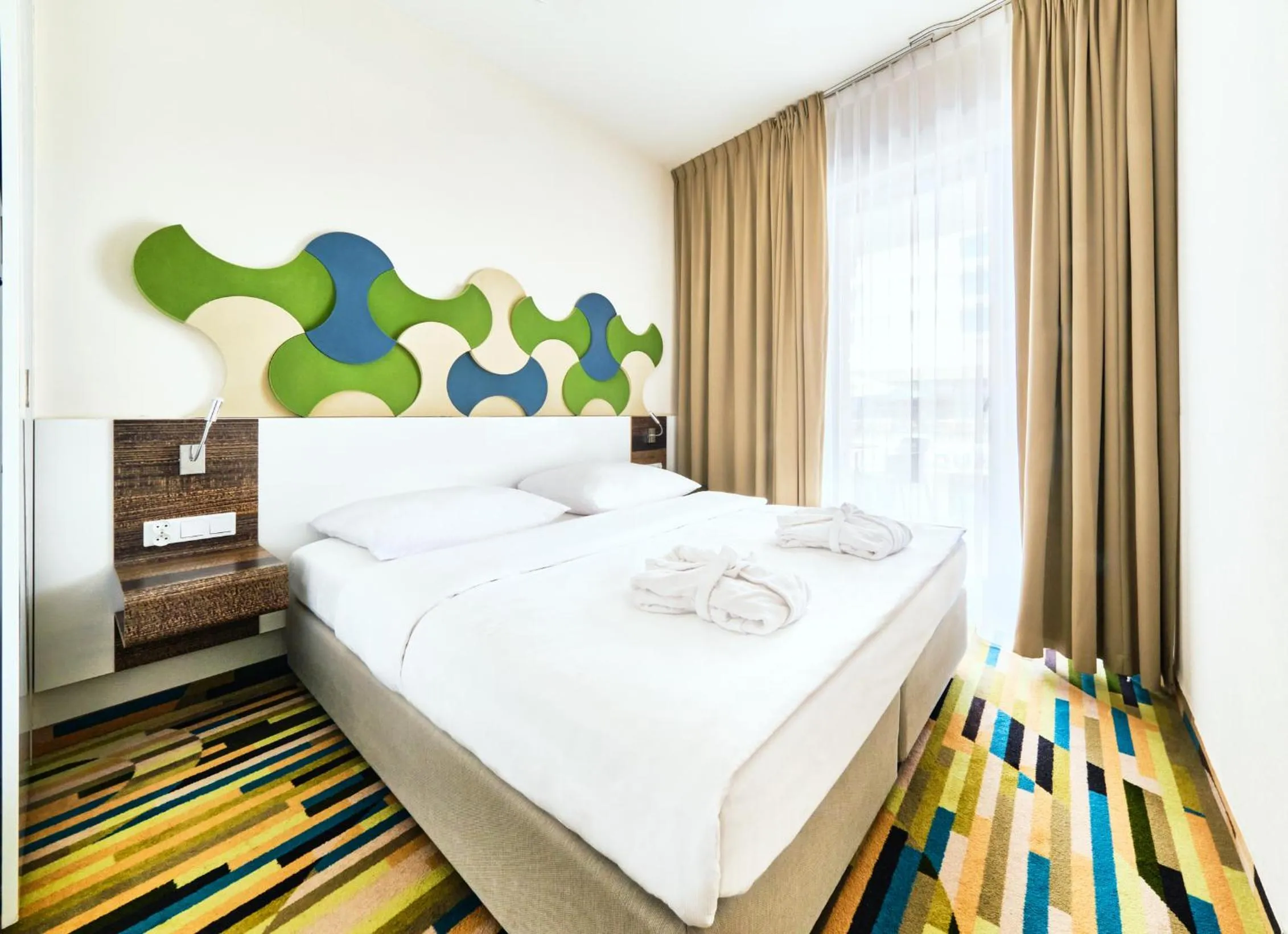 Bed in Baltic Park Molo Apartments by Zdrojowa