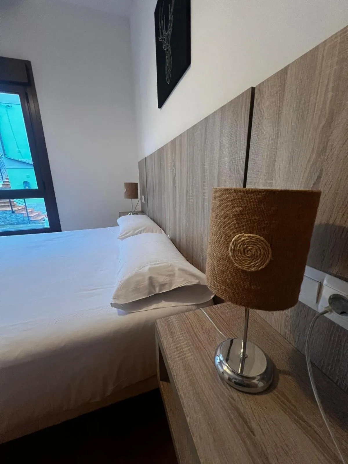Bedroom, Bed in Apartamentos El Caxigu