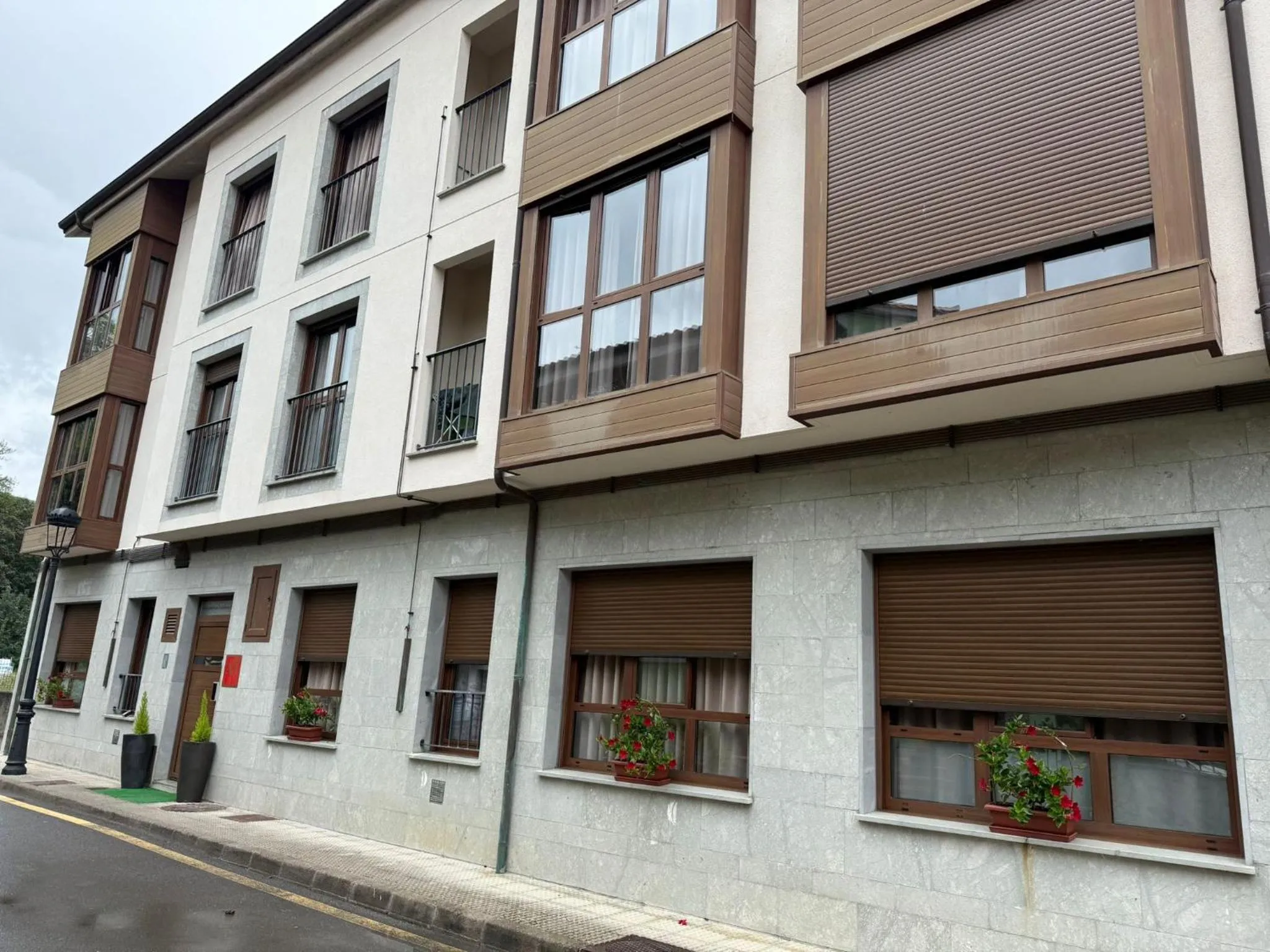 Property building in Apartamentos El Caxigu