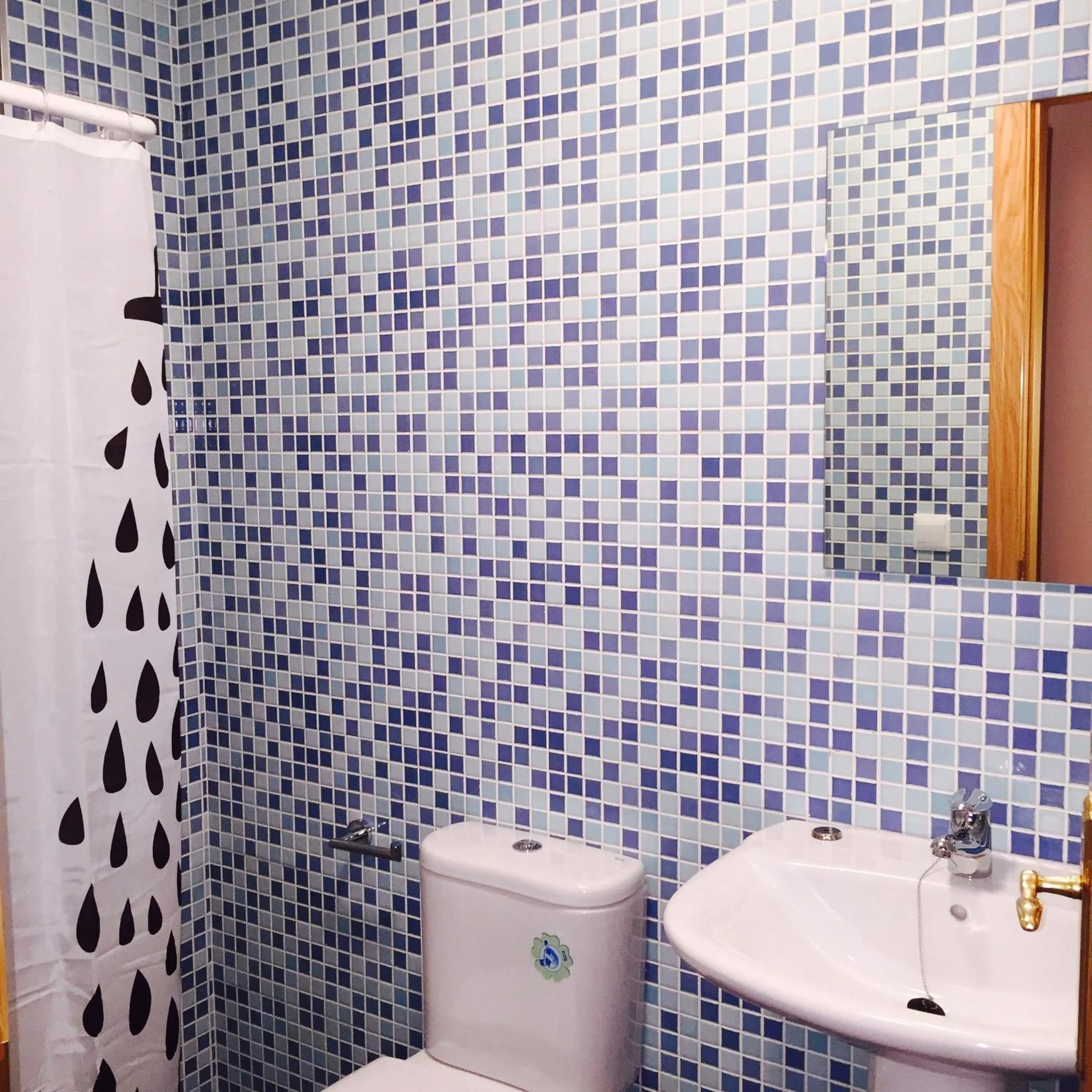 Bathroom in Apartamentos El Caxigu