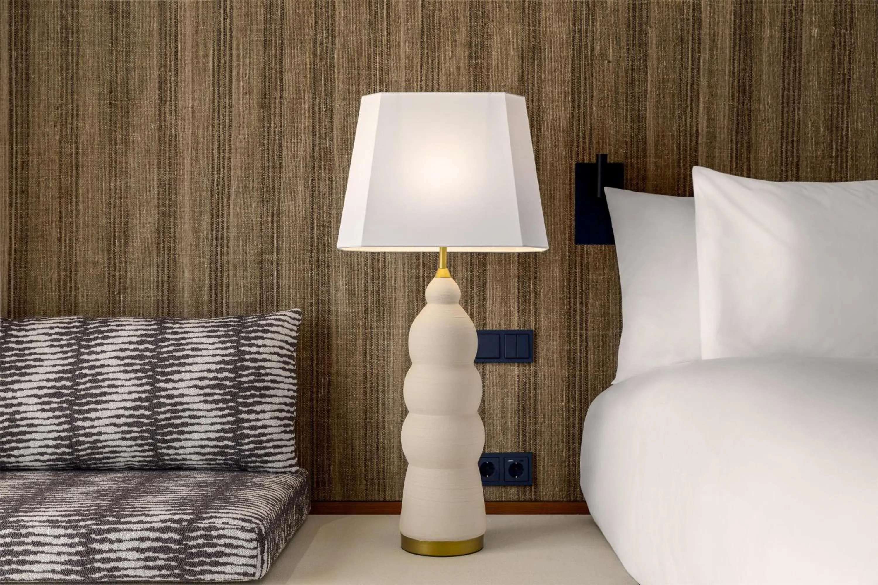 Decorative detail, Bed in Amarello Hotel Praia Santo André, Tapestry Collection by Hilton