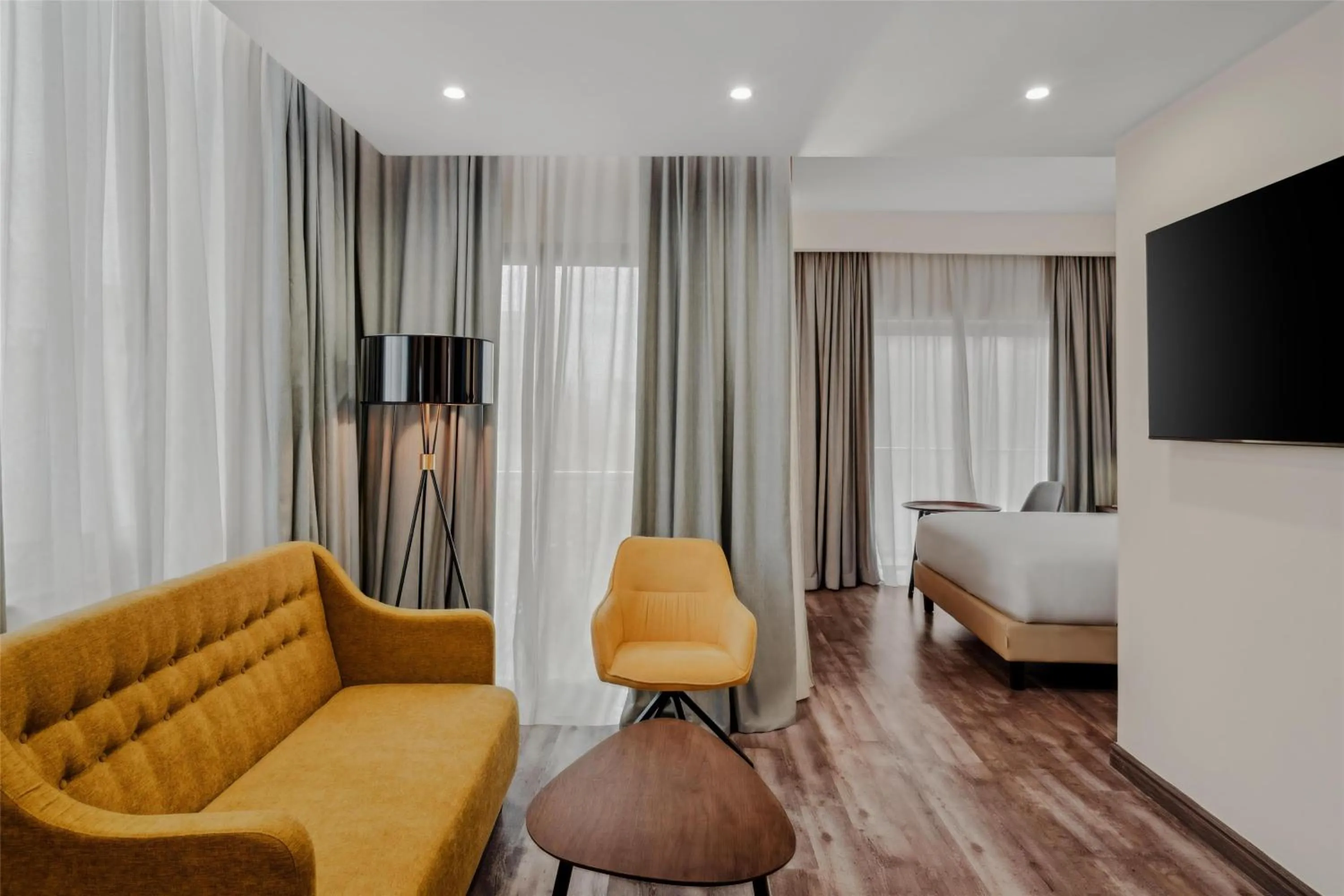 Living room, Bed in Doubletree By Hilton Addis Ababa Airport