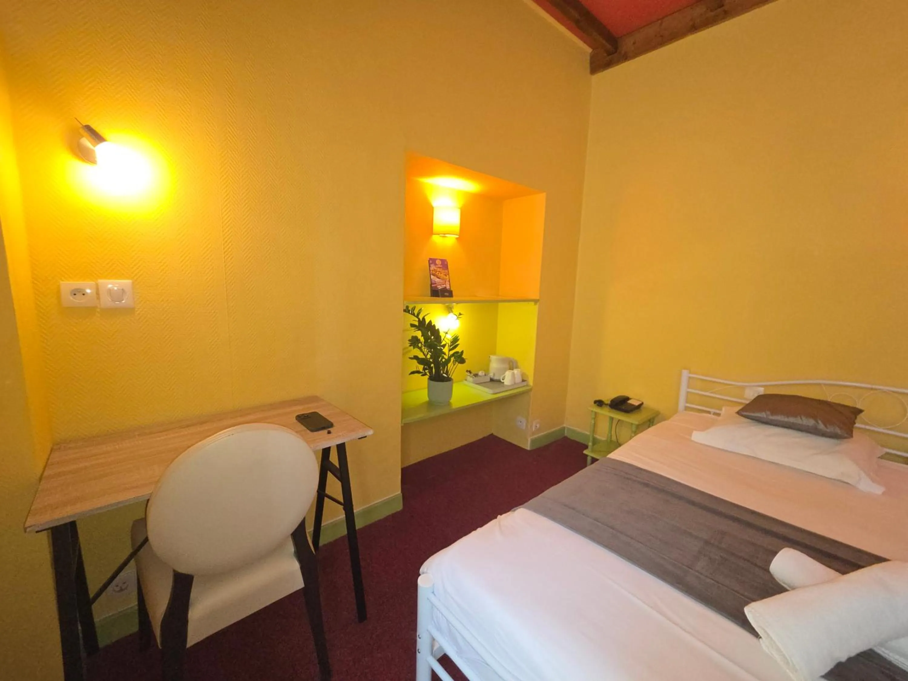 Bed in Hotel Magdeleine