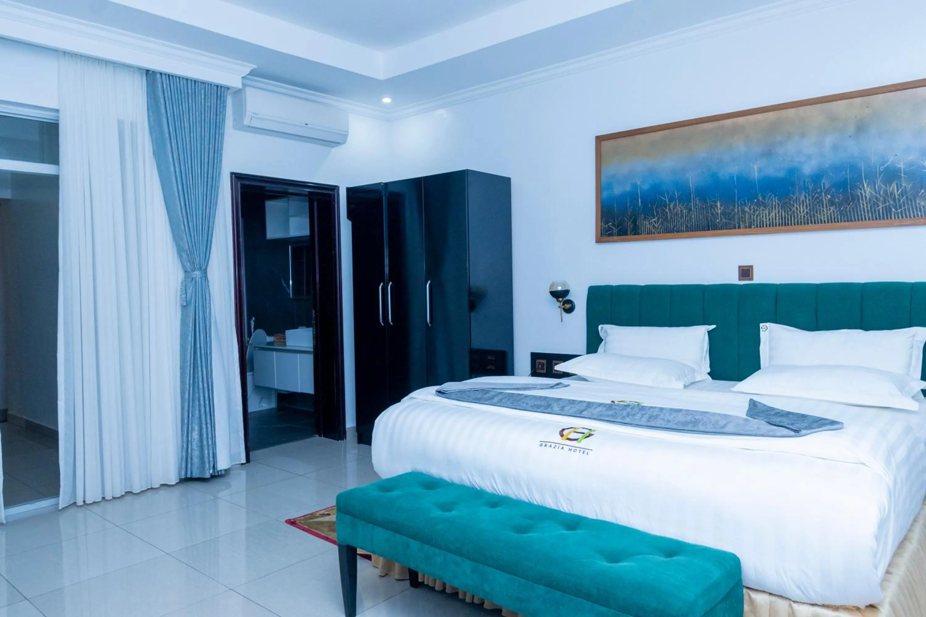 Bed in Grazia Apartment Hotel