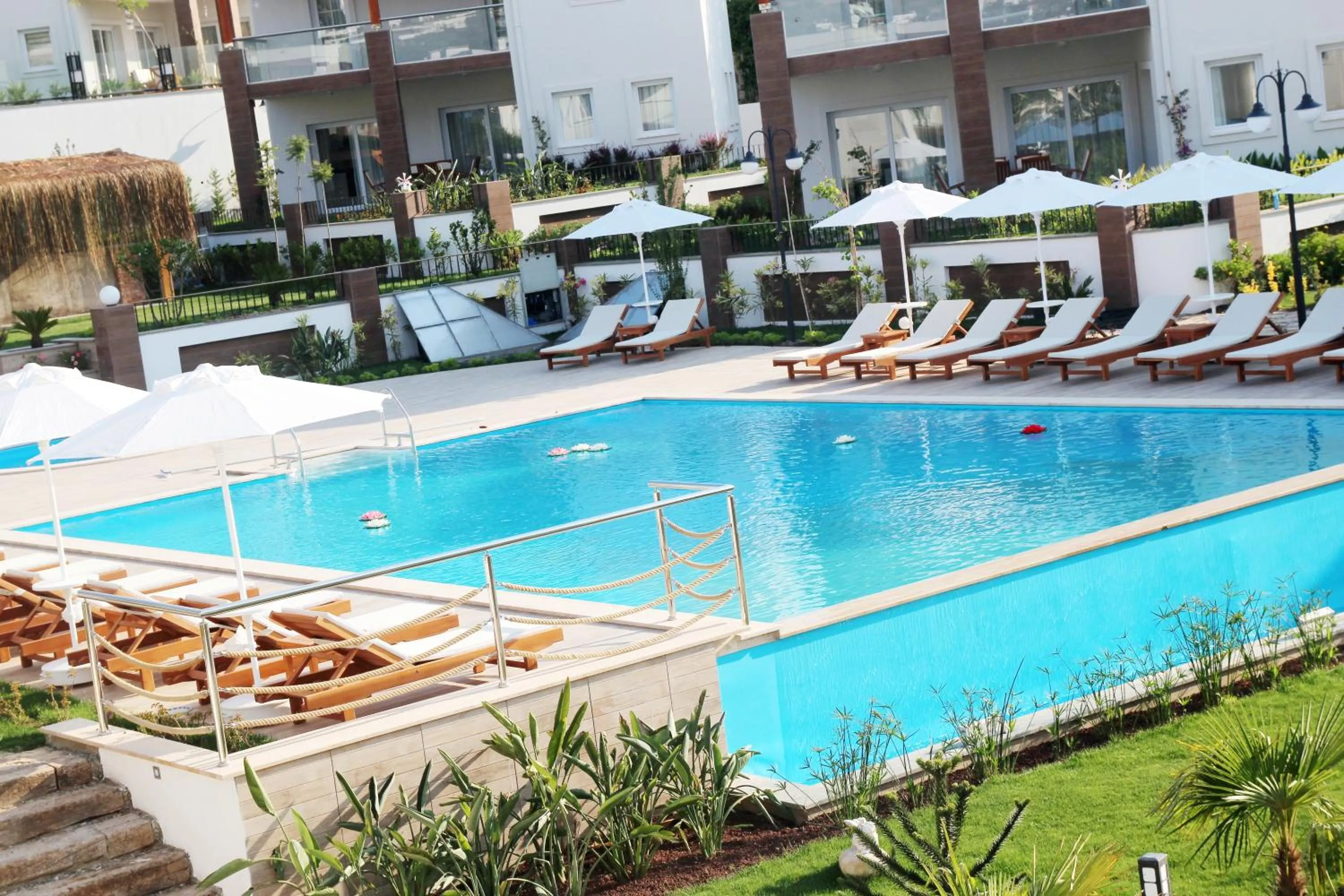 Swimming pool in Dibek Homes Villa & Hotel