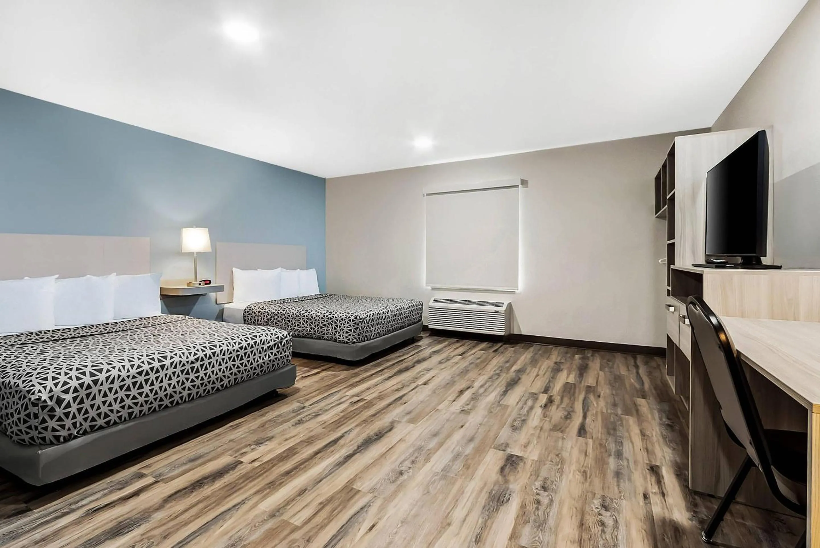 Bedroom, Bed in WoodSpring Suites Sumter near Shaw AFB
