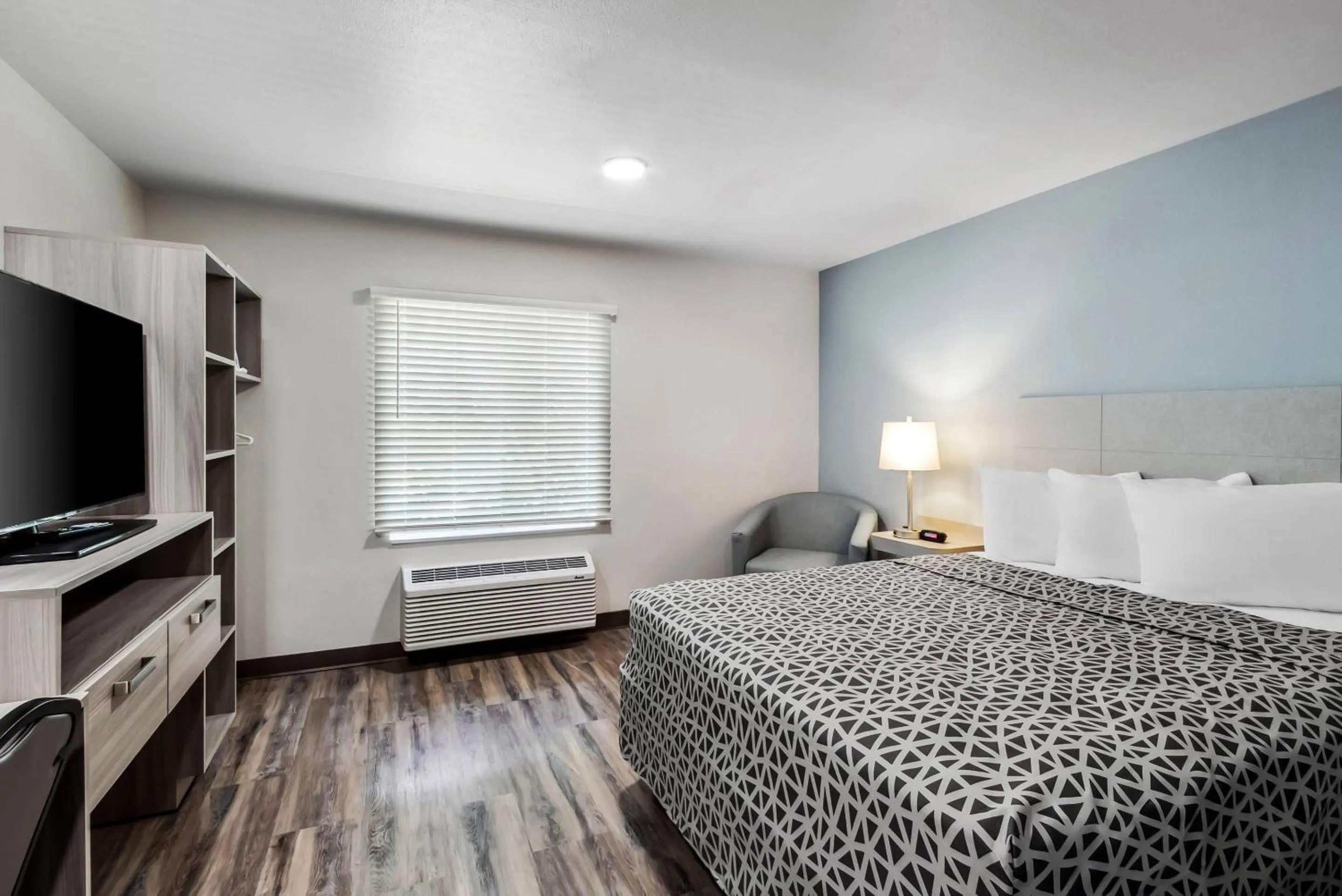Bedroom, Bed in WoodSpring Suites Sumter near Shaw AFB